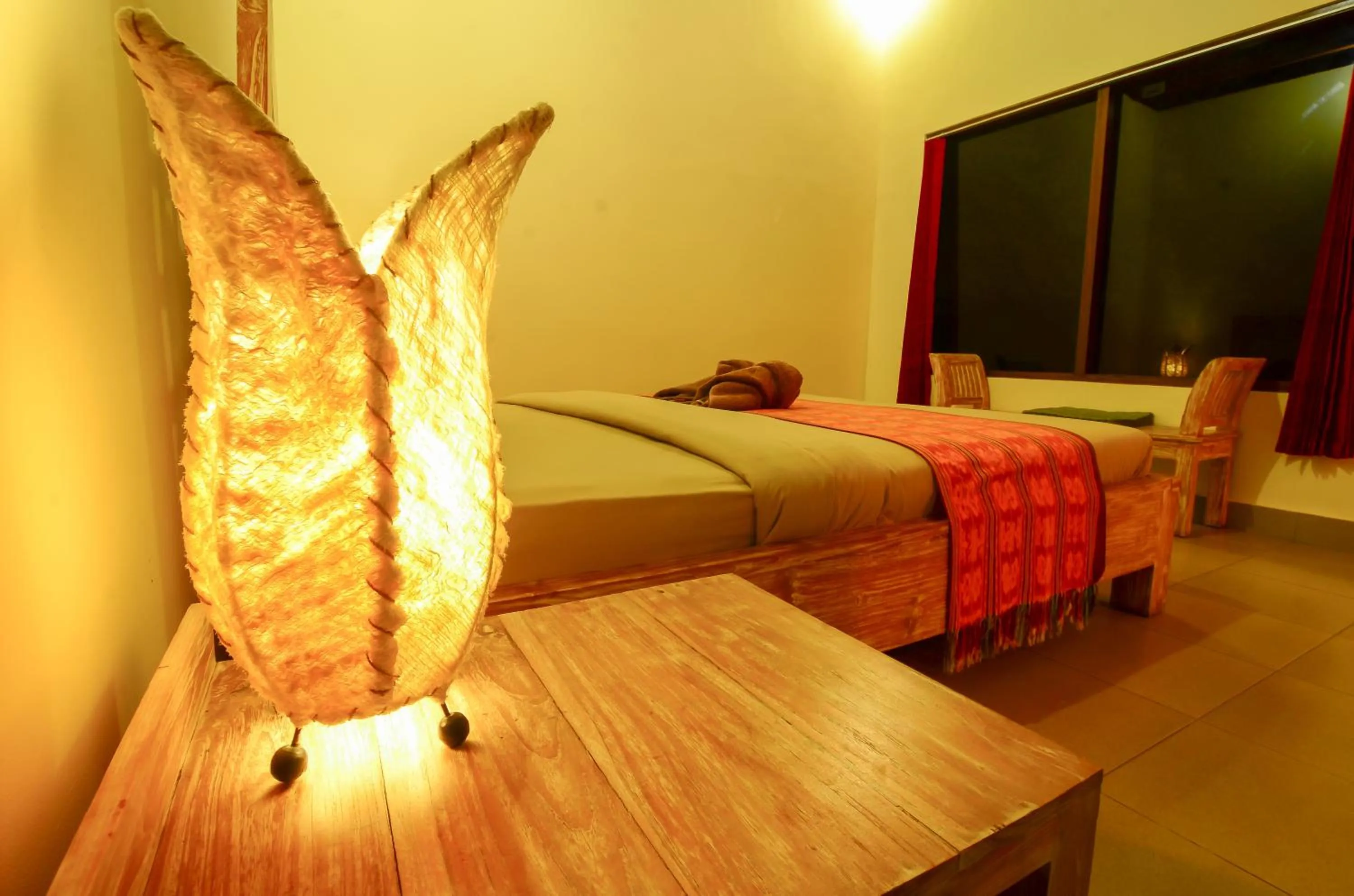 Bed in Mapa Lake View Bungalow