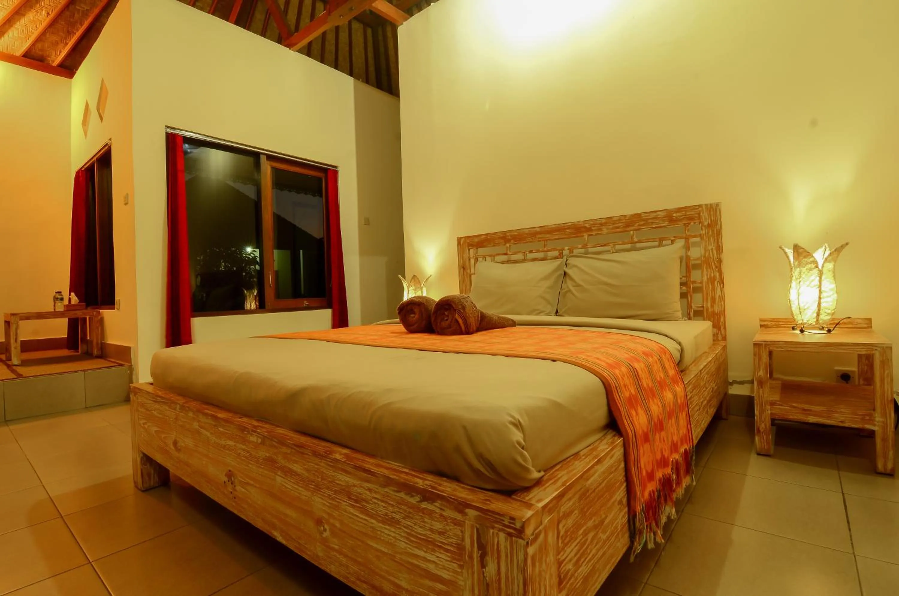 Bed in Mapa Lake View Bungalow