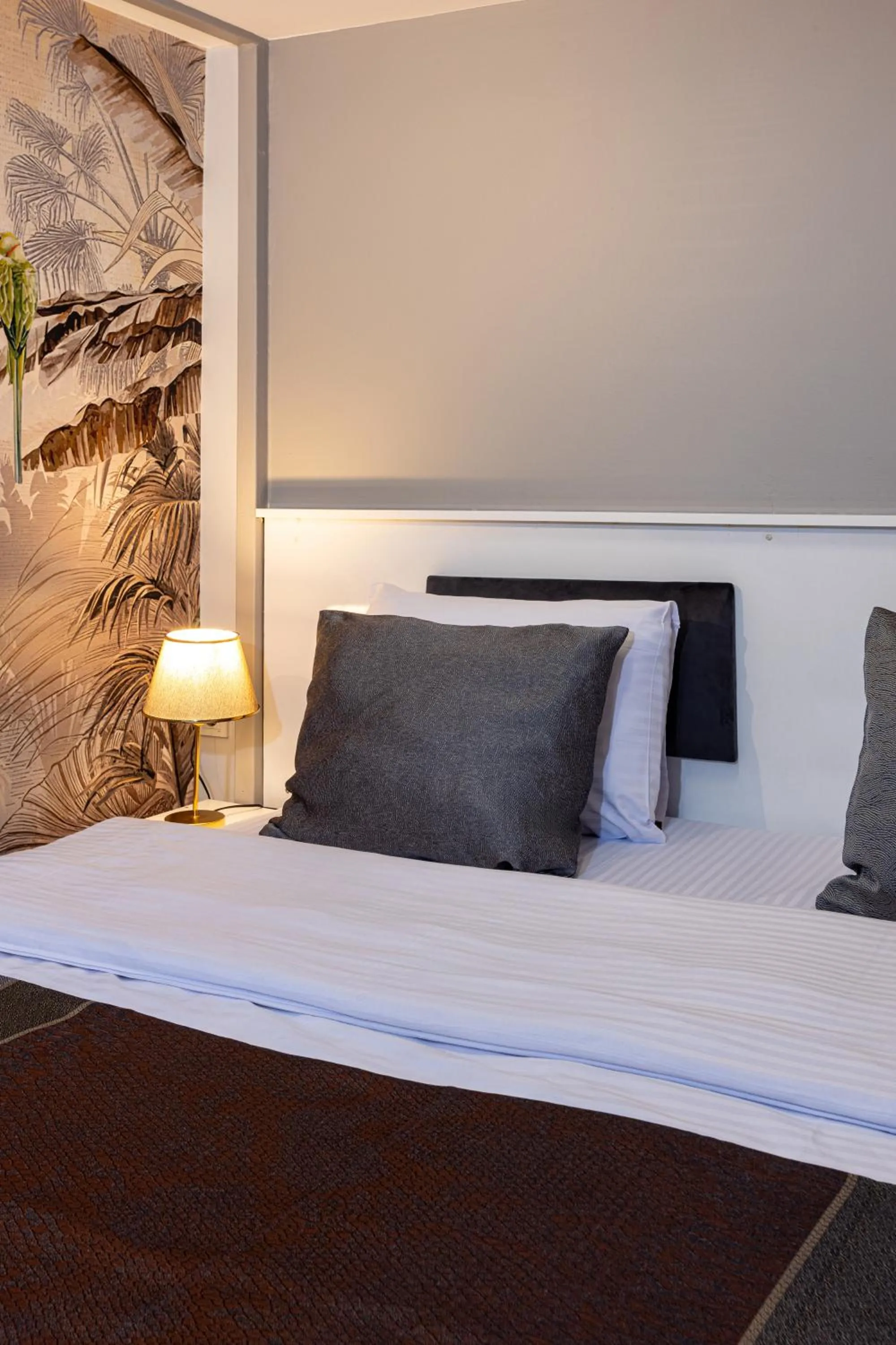 Bed in APOLLO HOTEL & APARTMENtS