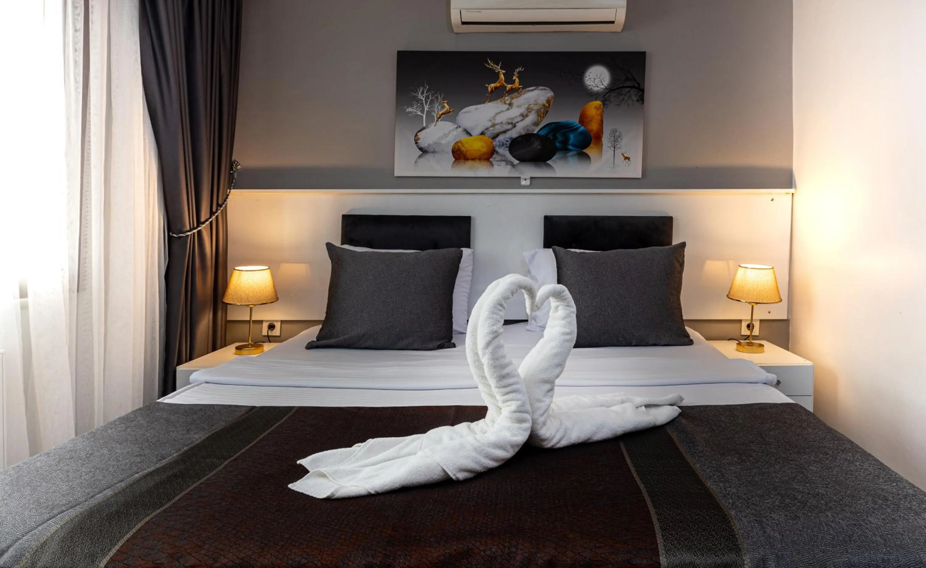 Bed in APOLLO HOTEL & APARTMENtS