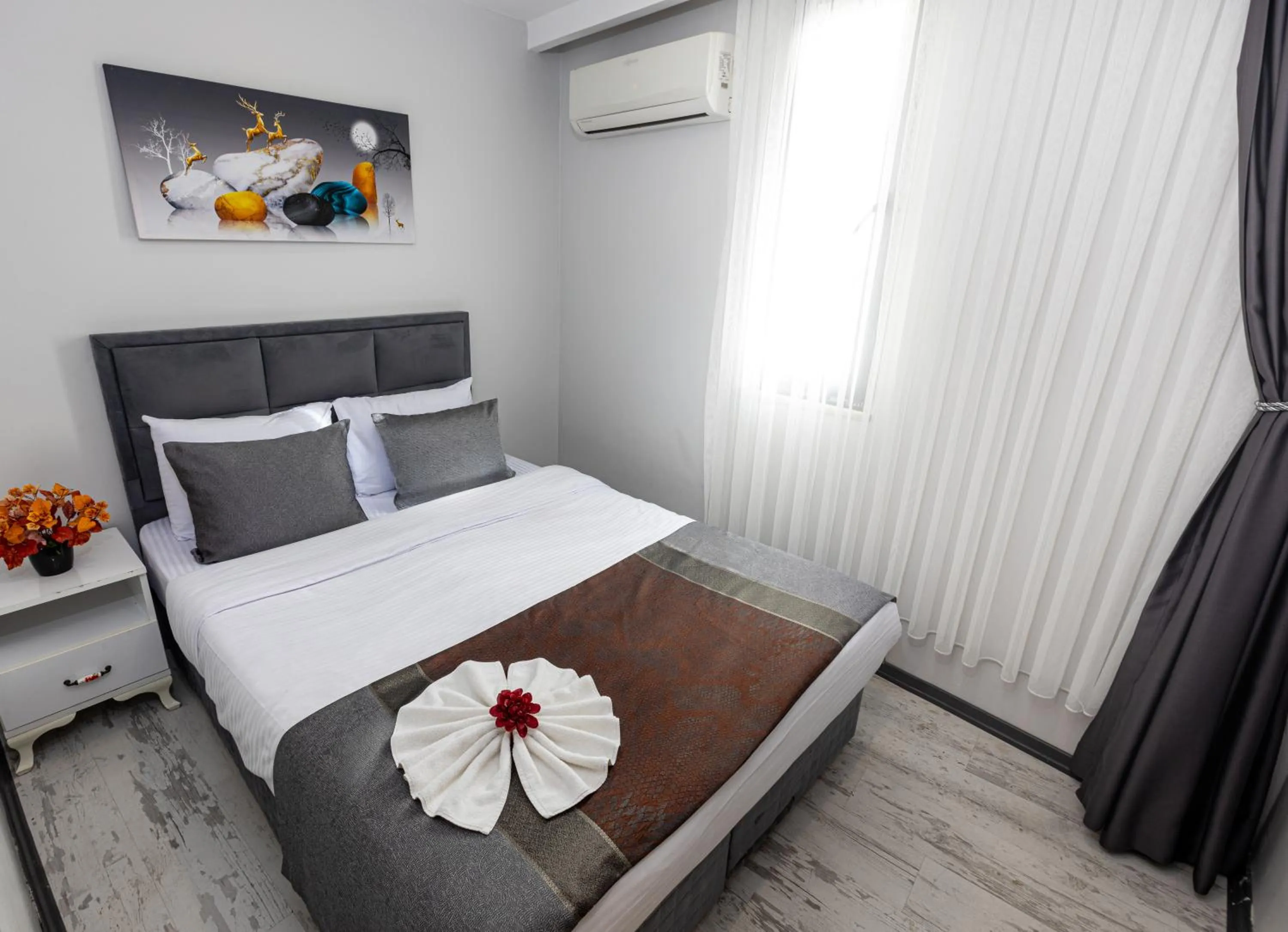 Bed in APOLLO HOTEL & APARTMENtS