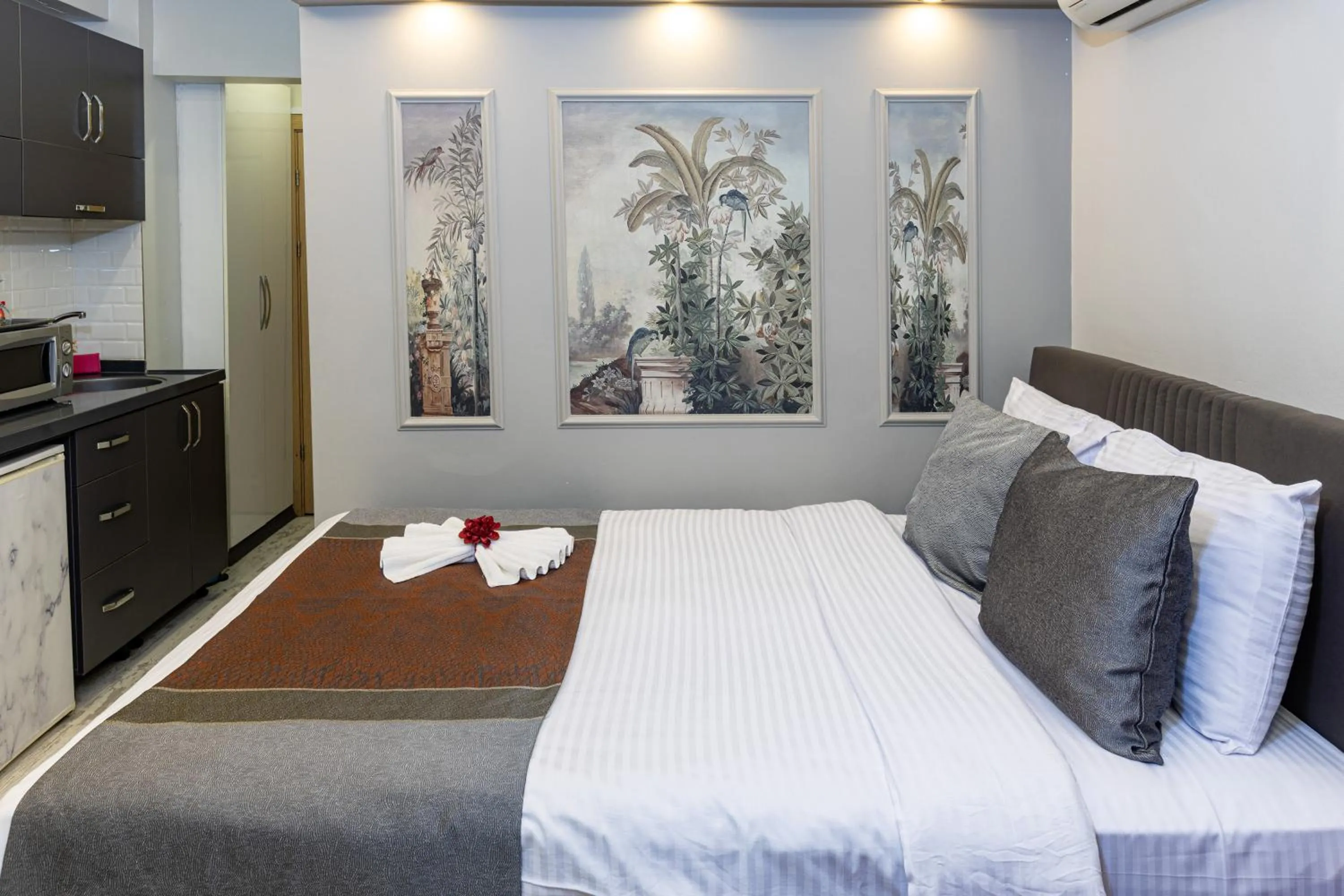 Bed in APOLLO HOTEL & APARTMENtS