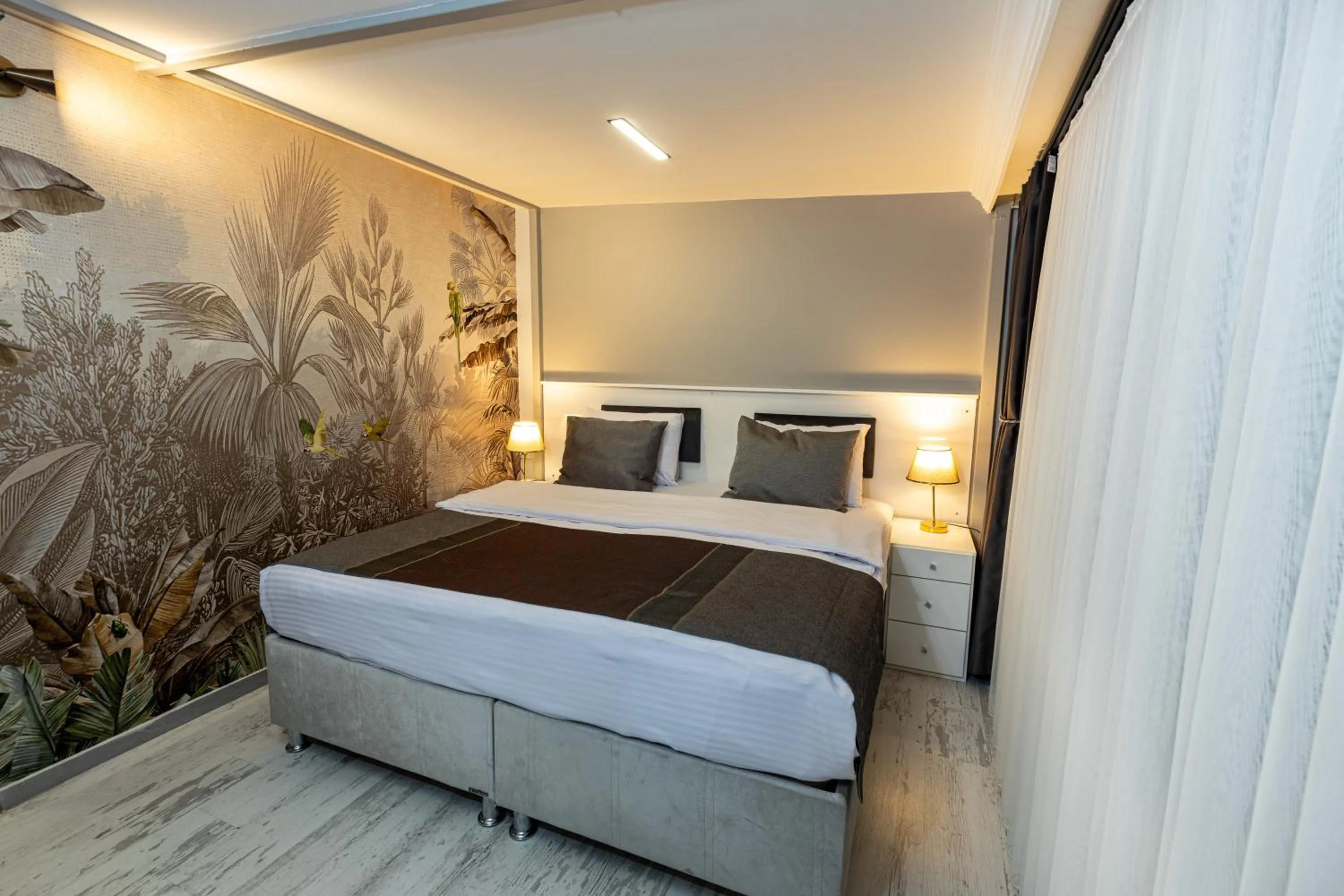 Bed in APOLLO HOTEL & APARTMENtS