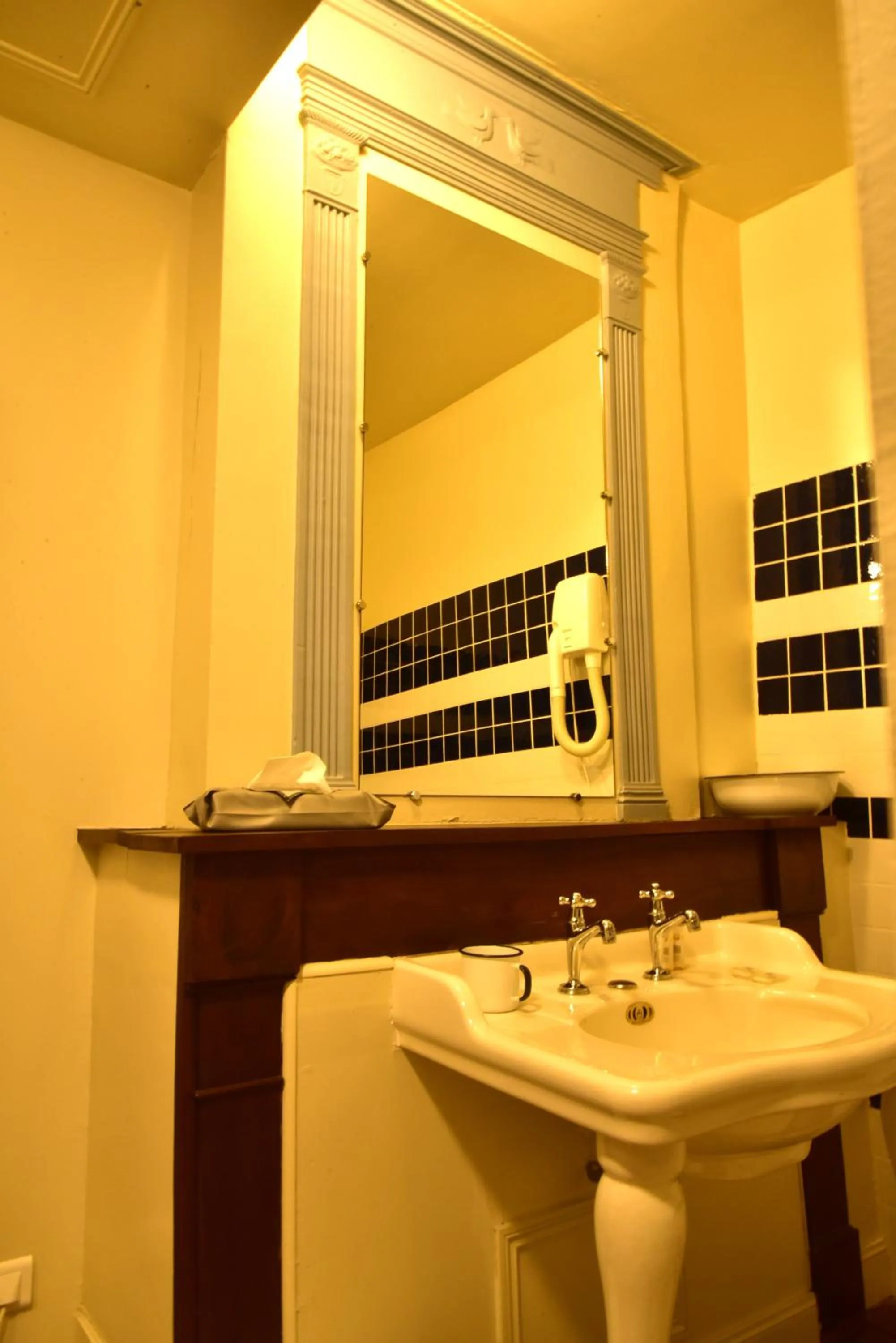 Bathroom in Logis Hôtel Le Boudoir