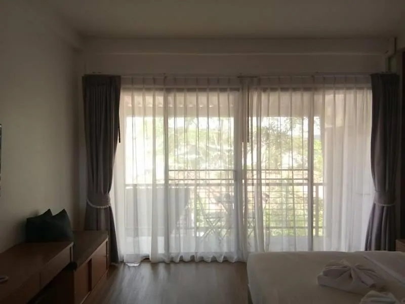 Property building, Bed in Palmari Boutique Hotel