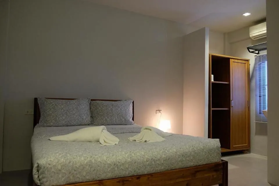 Bed in Palmari Boutique Hotel