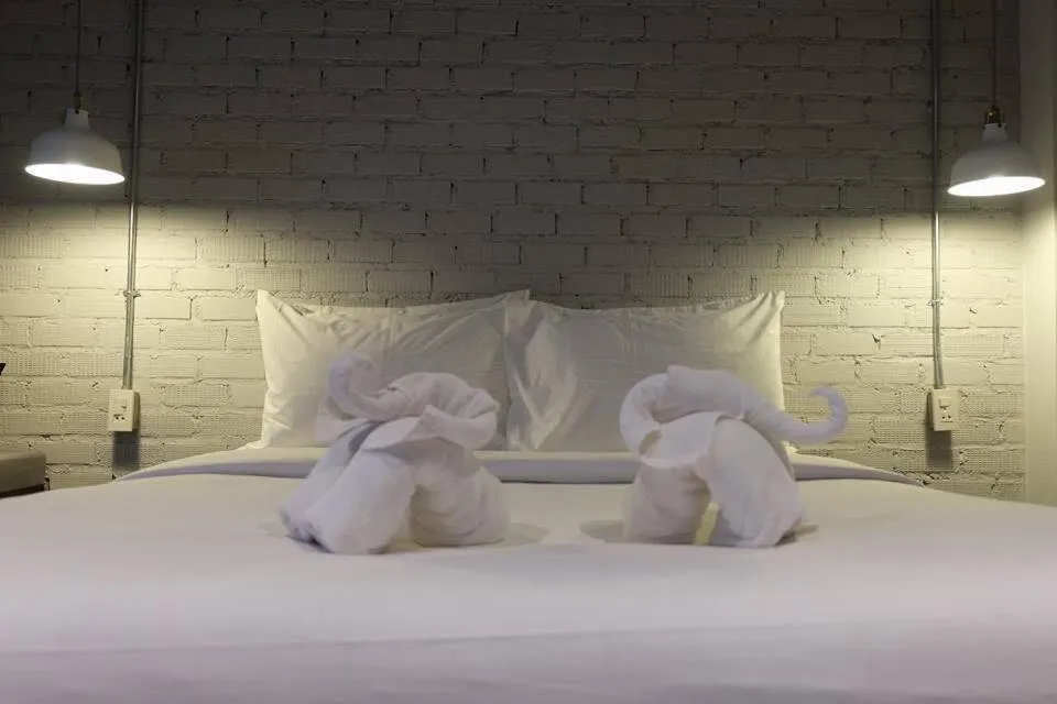 Bed in Palmari Boutique Hotel