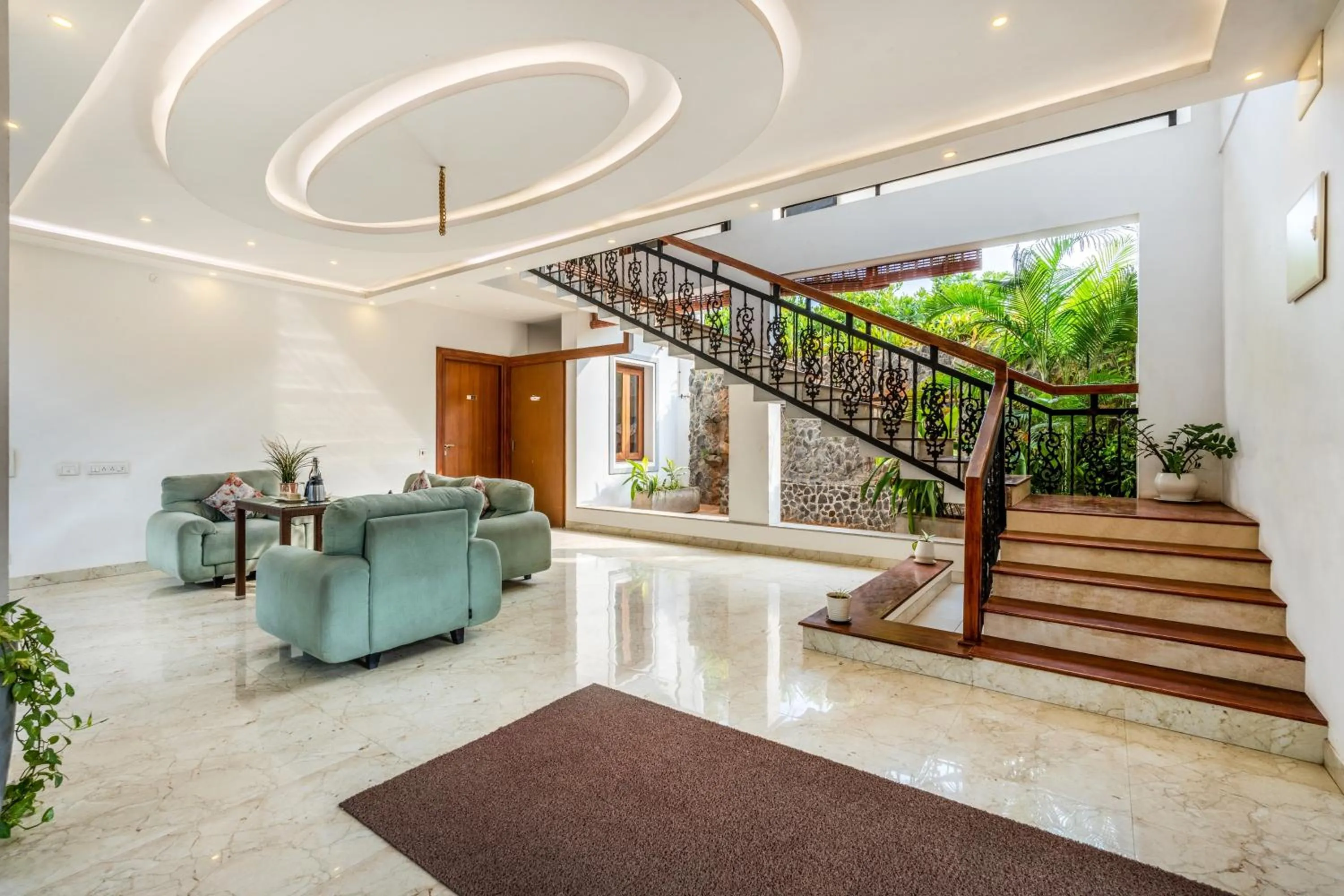 Seating area in Treebo Premium Villa Escape In With Pool View