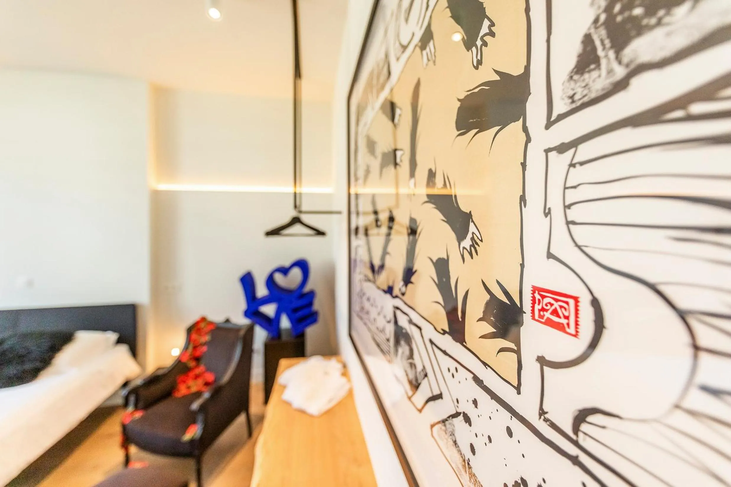 Seating area, Bed in BareFoodGIULIA - Inspiration Hotel