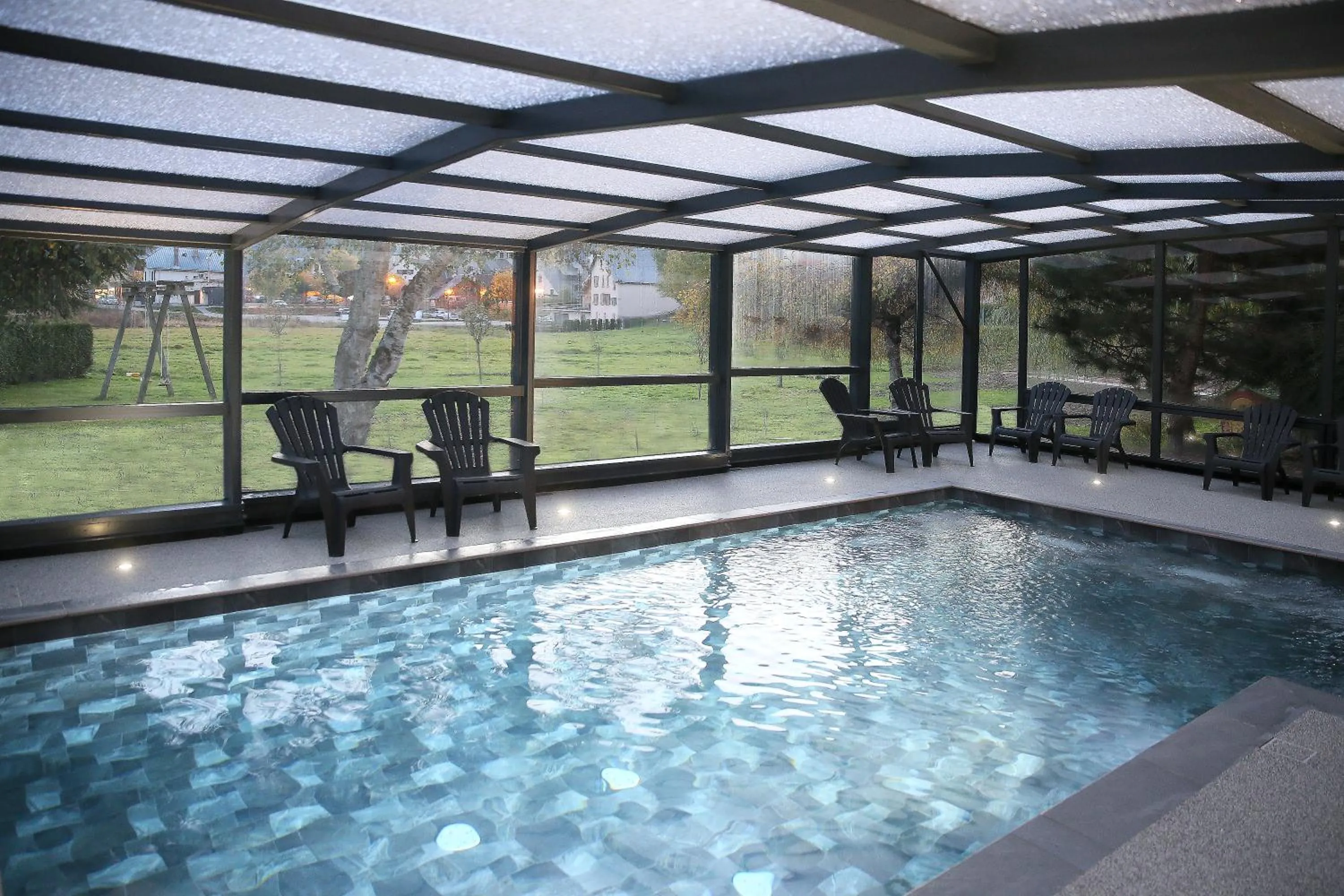 Swimming pool in Hôtel Restaurant La Buffe