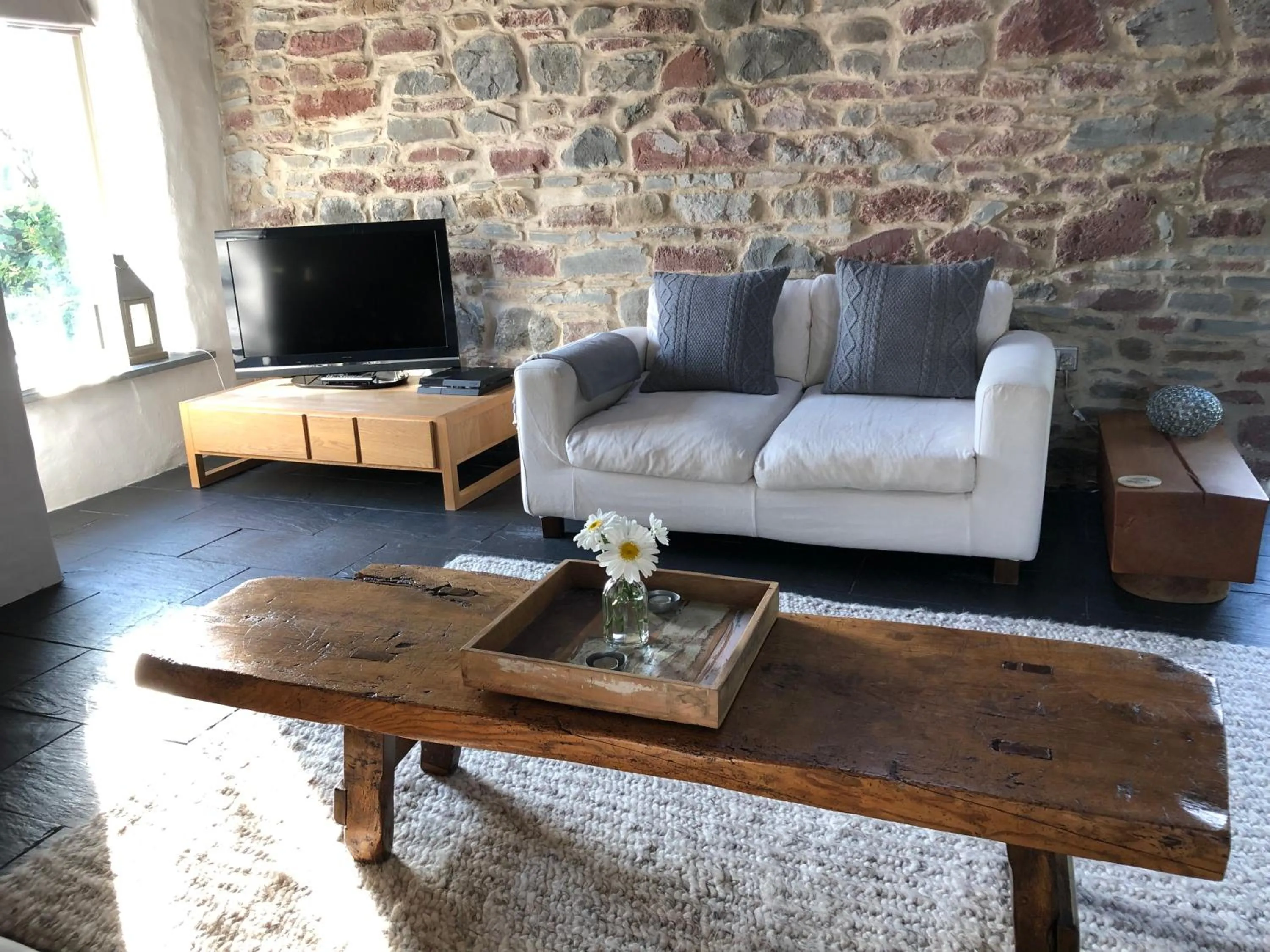 Seating area in Dan y Graig Barn, Carmarthen