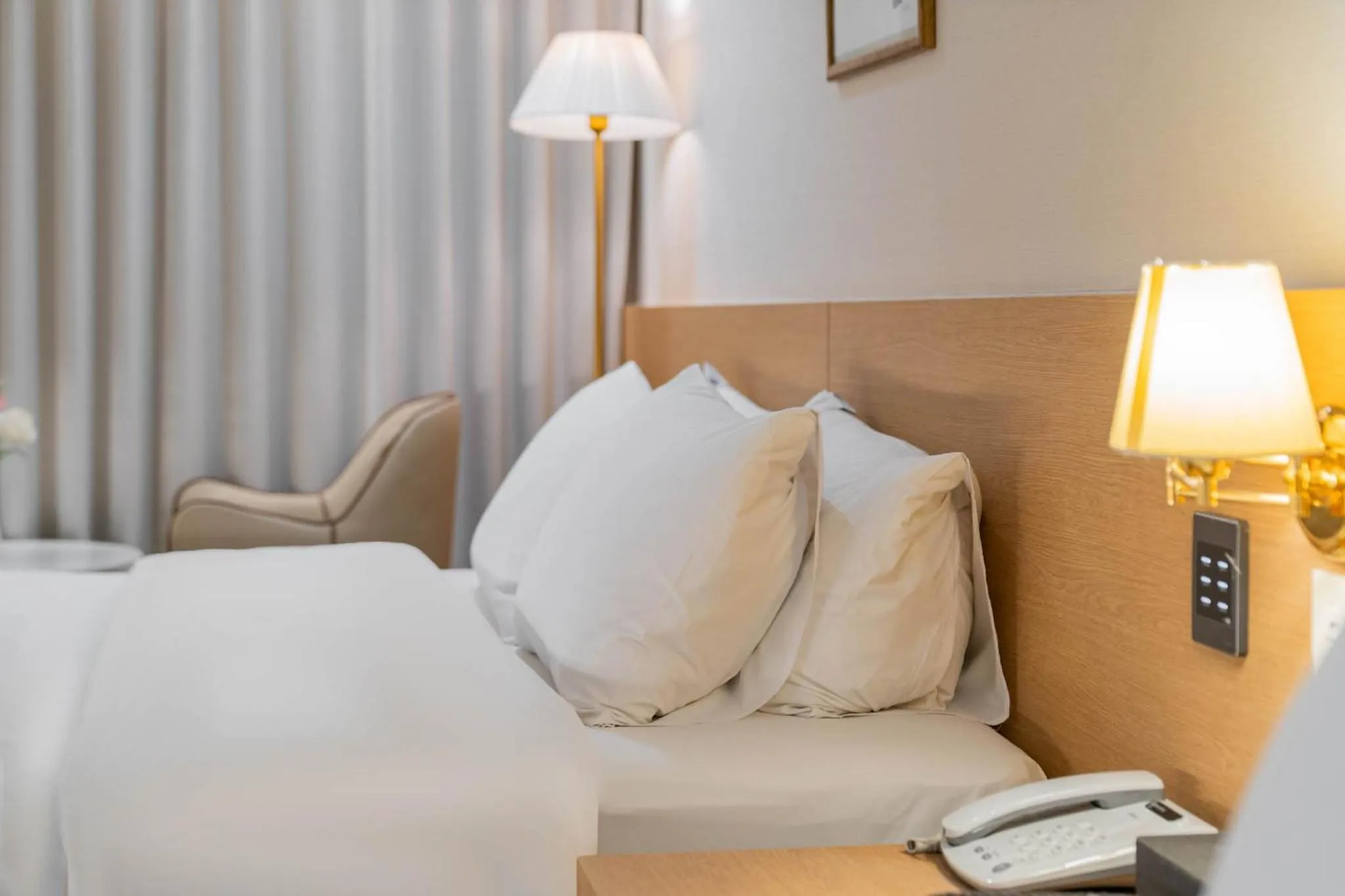 Bed in Benikea Hotel Bizinn