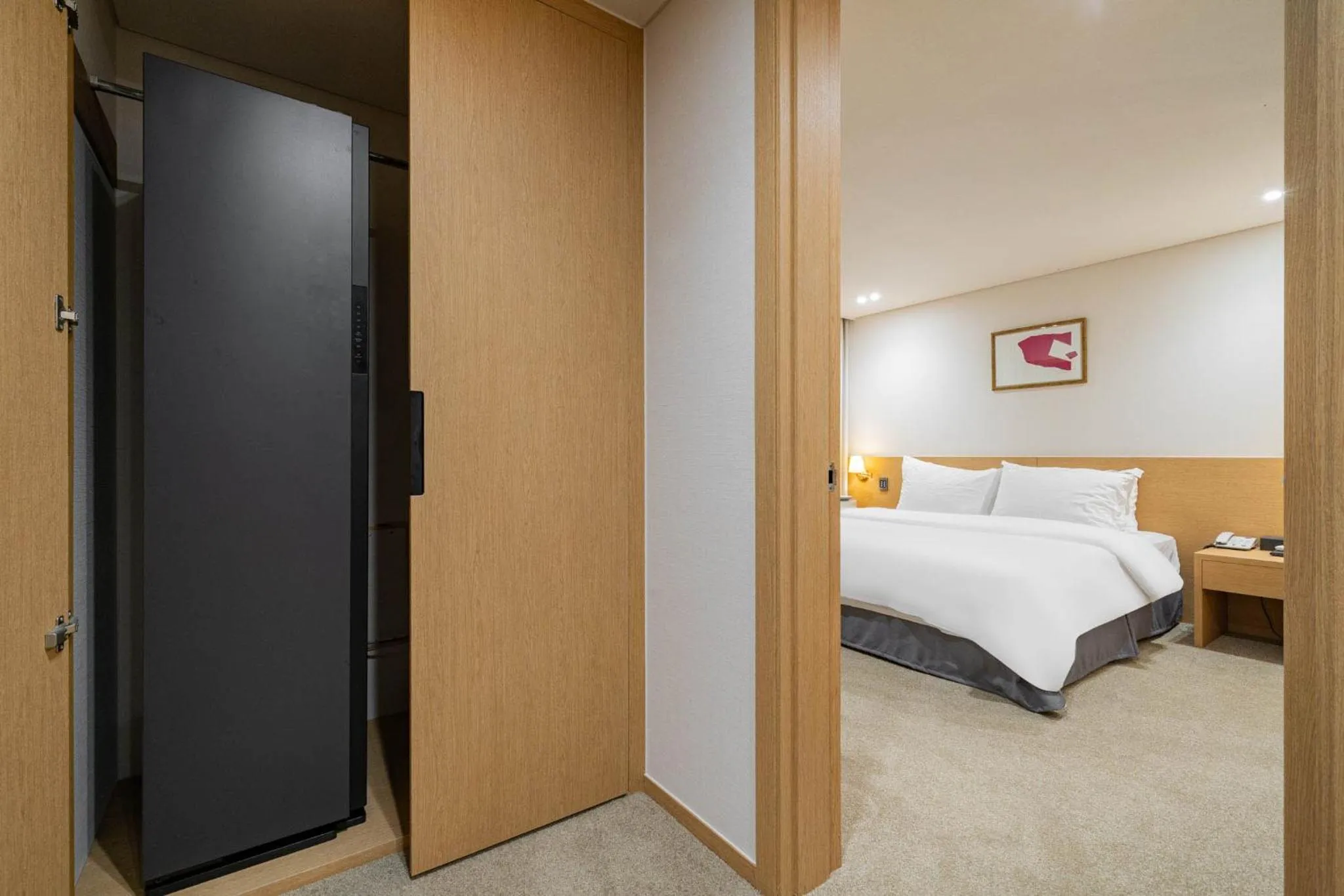 Bed in Benikea Hotel Bizinn