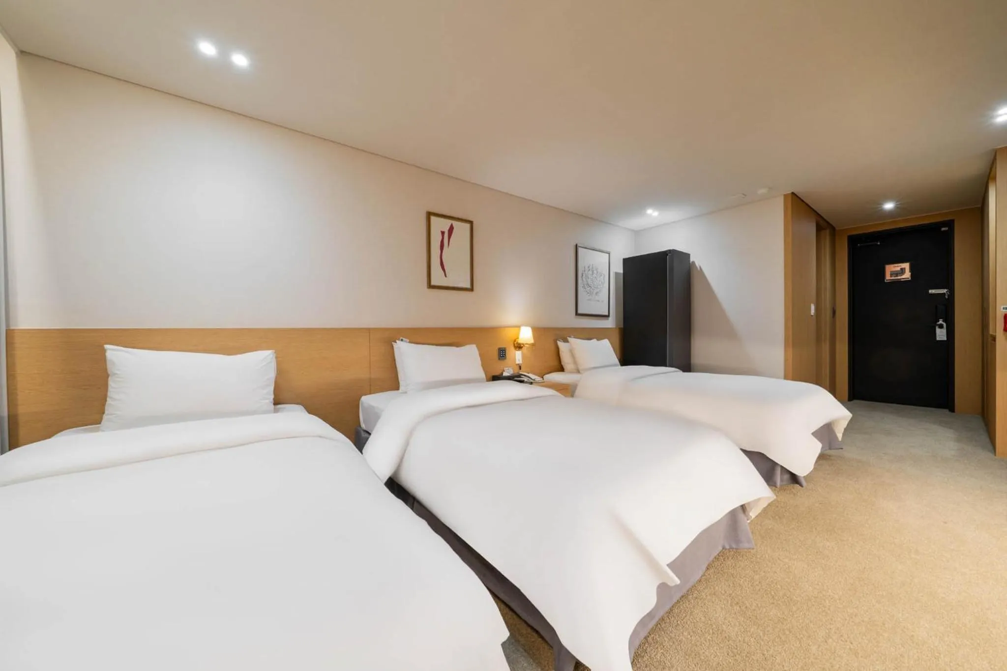 Bed in Benikea Hotel Bizinn