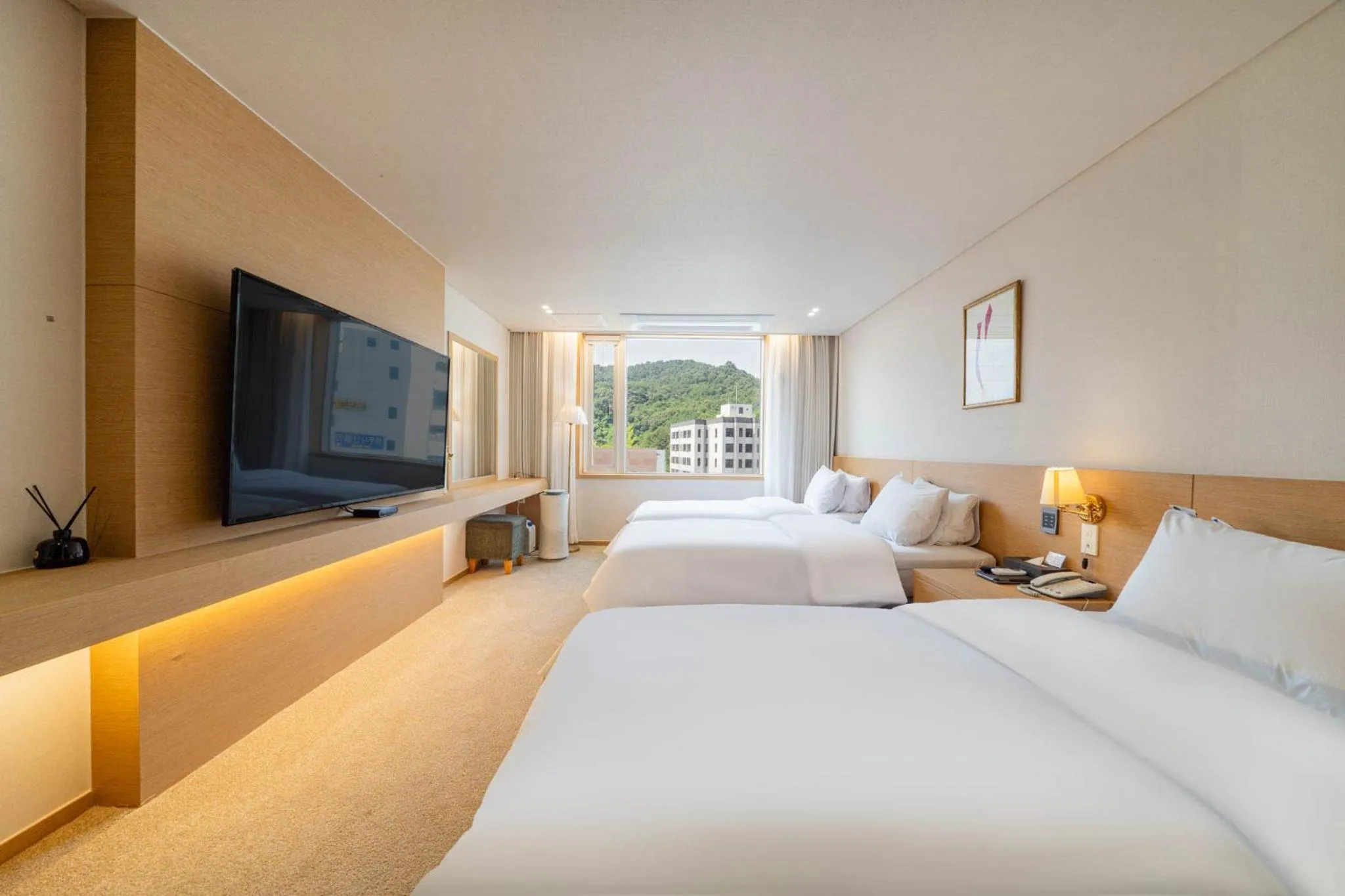 Bed in Benikea Hotel Bizinn