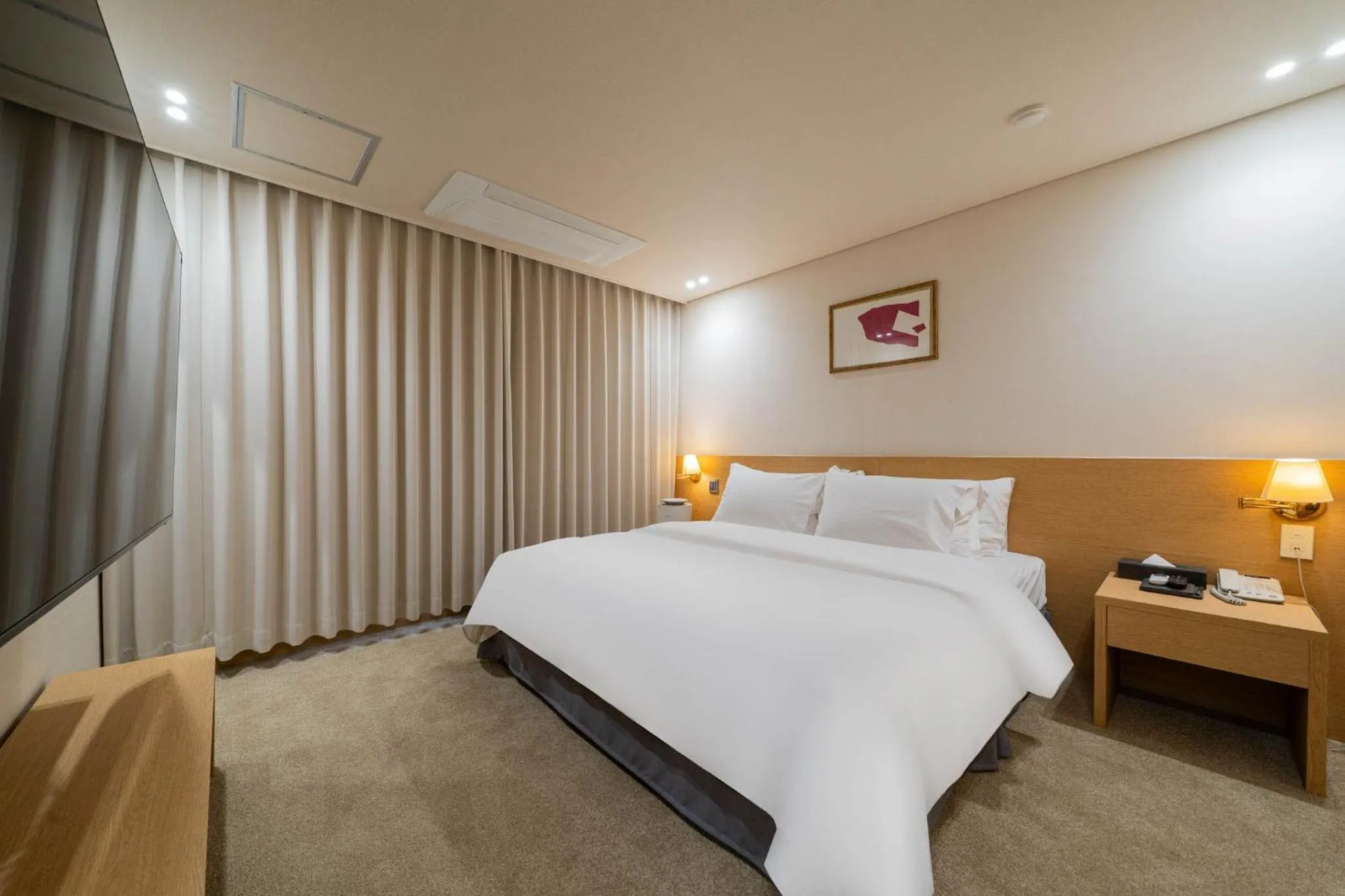 Bed in Benikea Hotel Bizinn