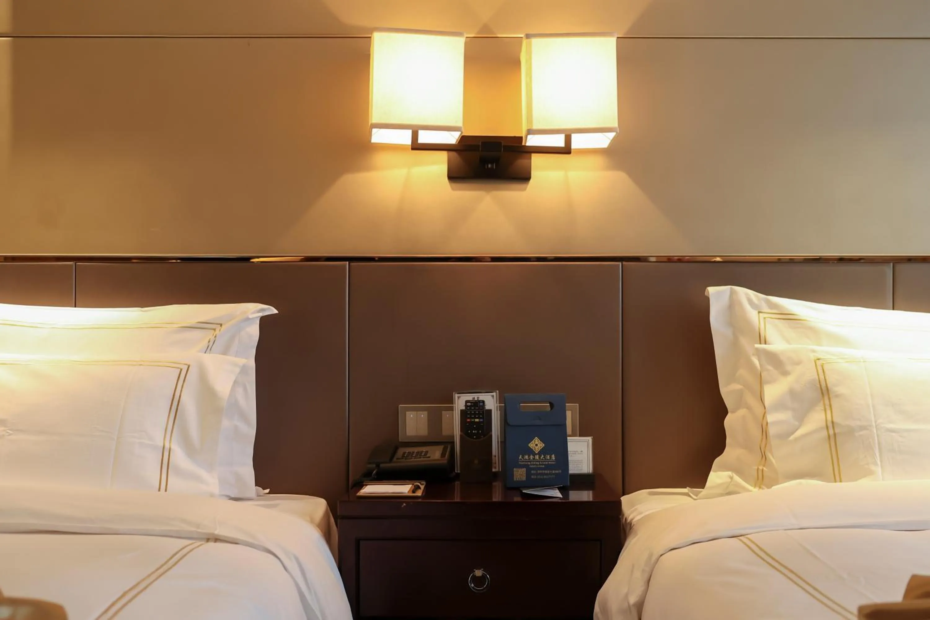 Bed in Tianhong Jinling Grand Hotel