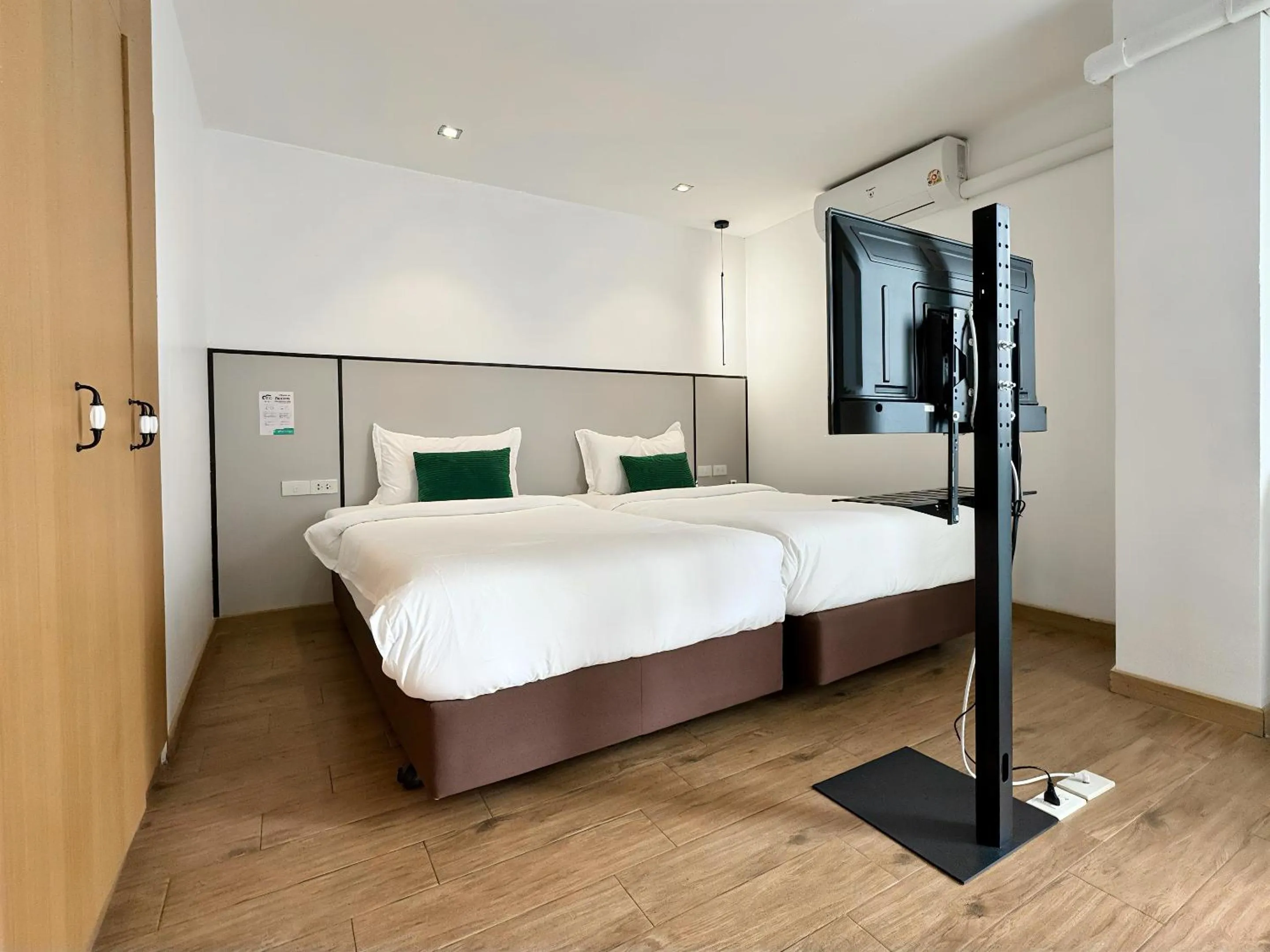 Bed in Pentafield City Residence