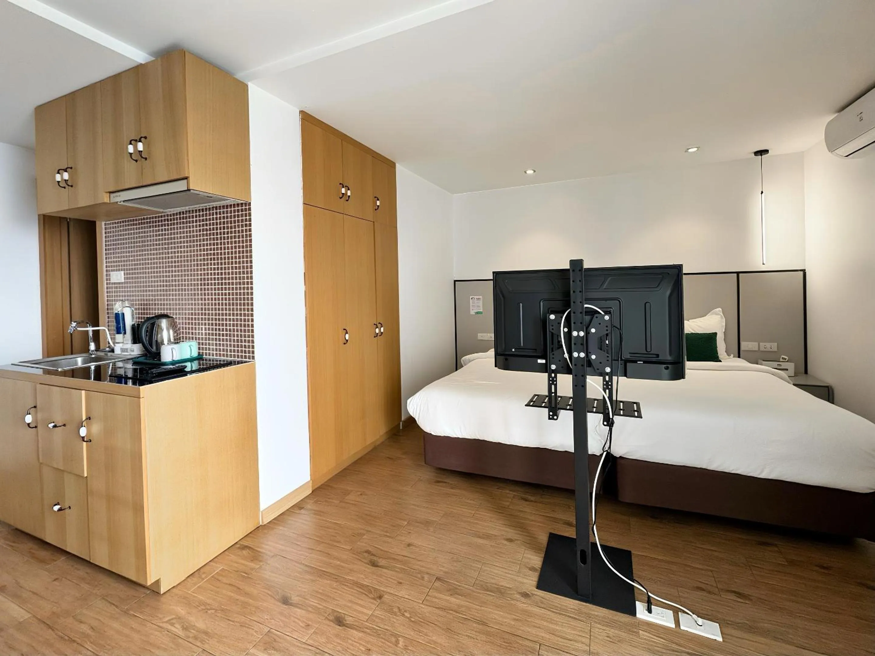 Bed in Pentafield City Residence