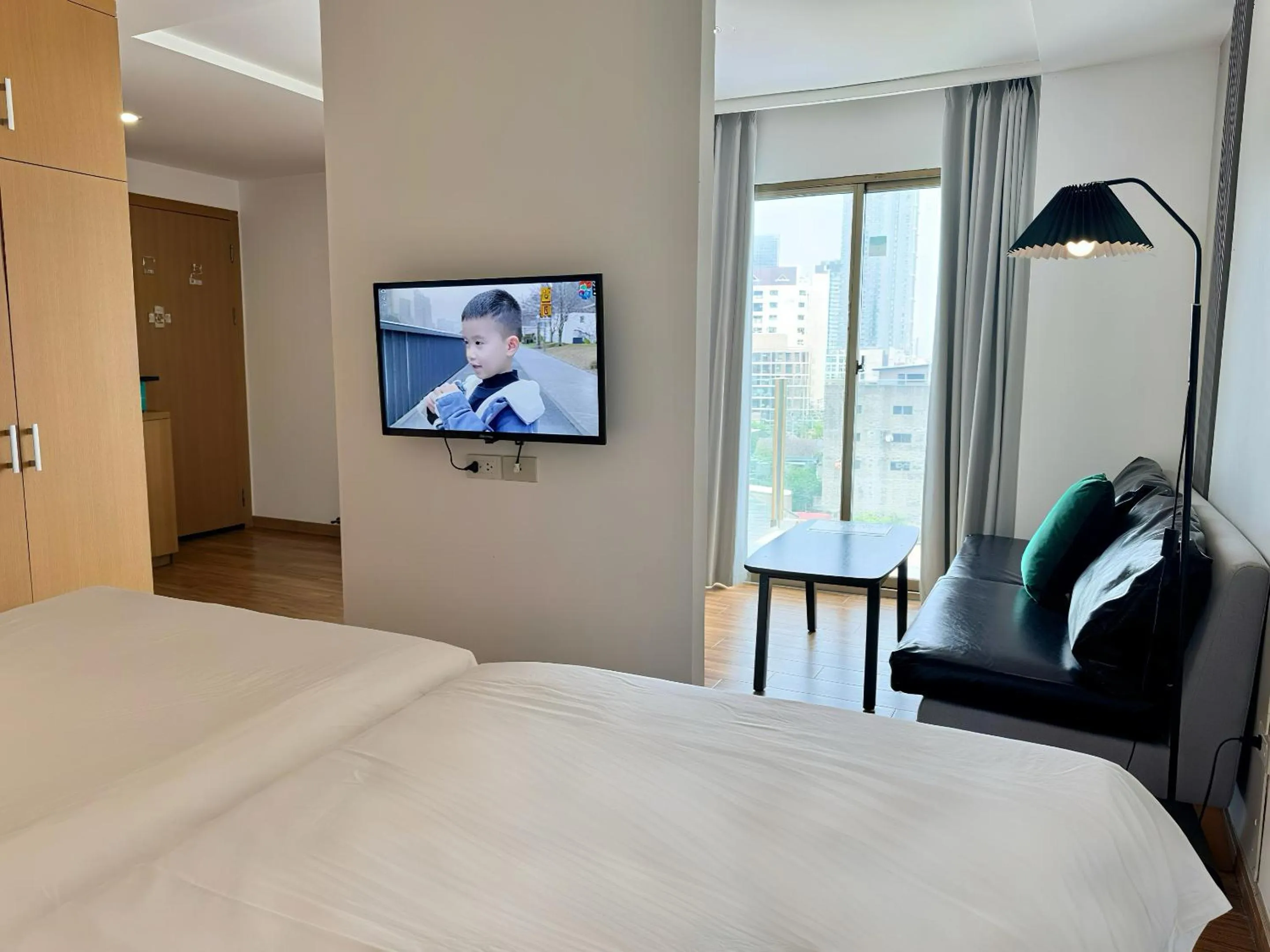 Bed in Pentafield City Residence