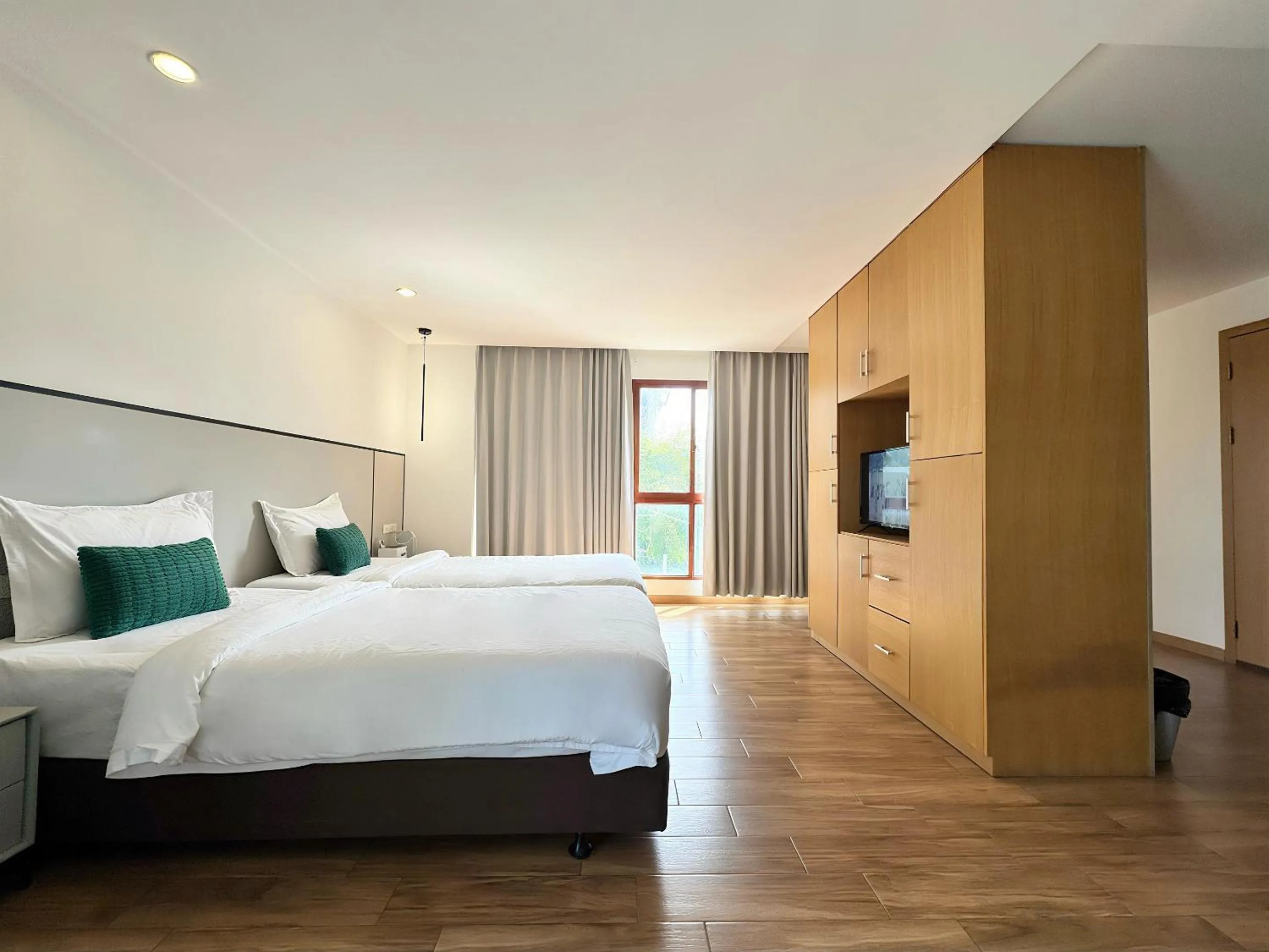 Bed in Pentafield City Residence