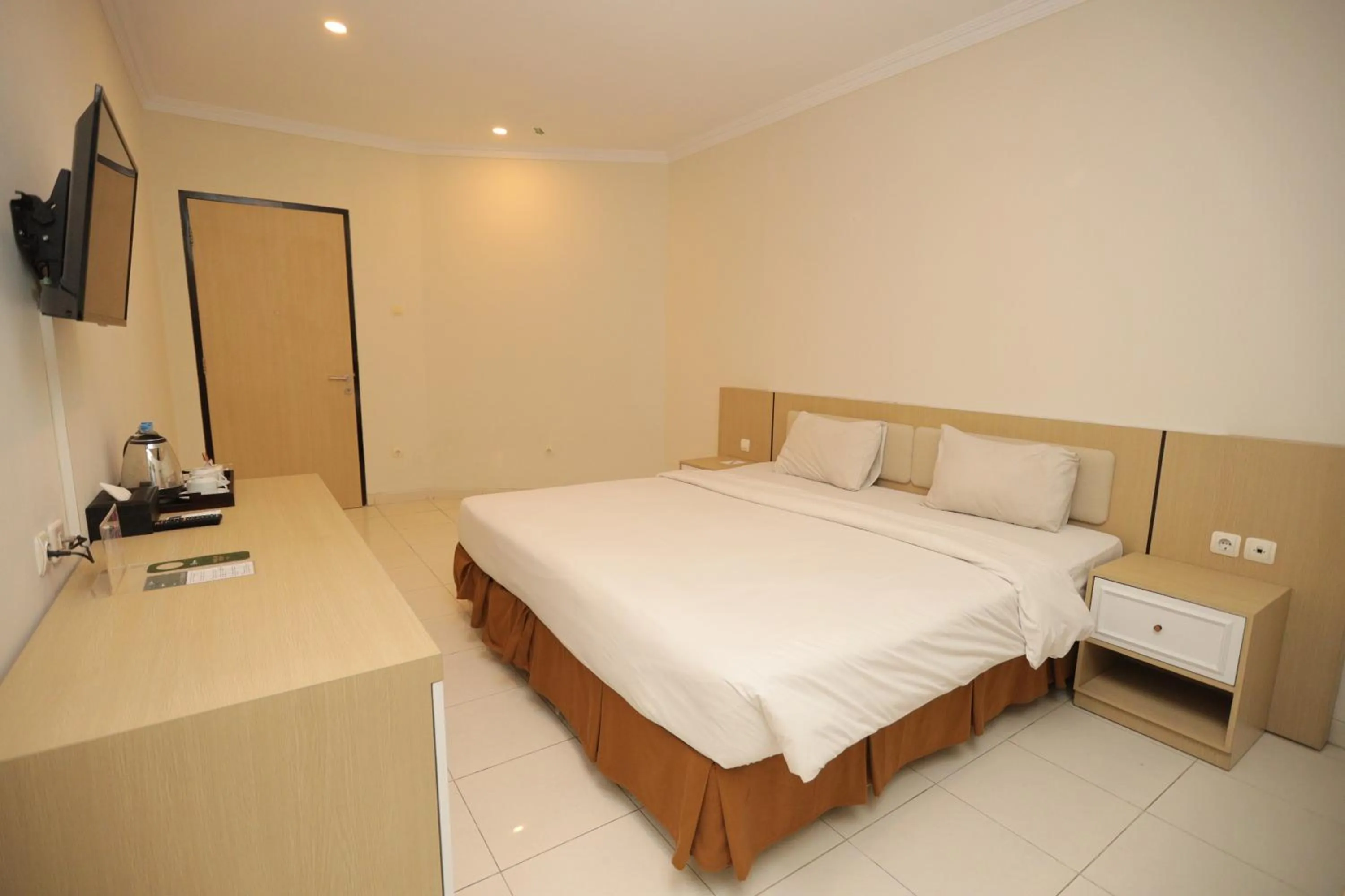 Bed in LPP Garden Hotel