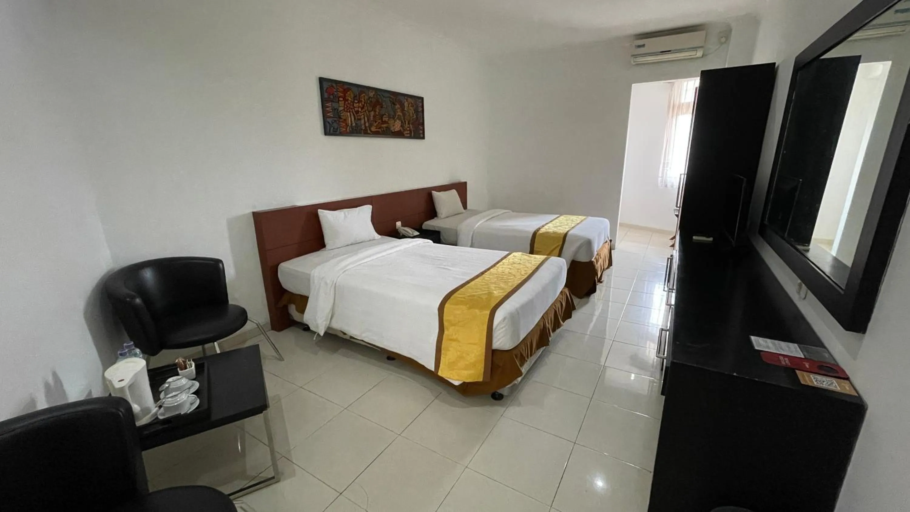 Bed in LPP Garden Hotel