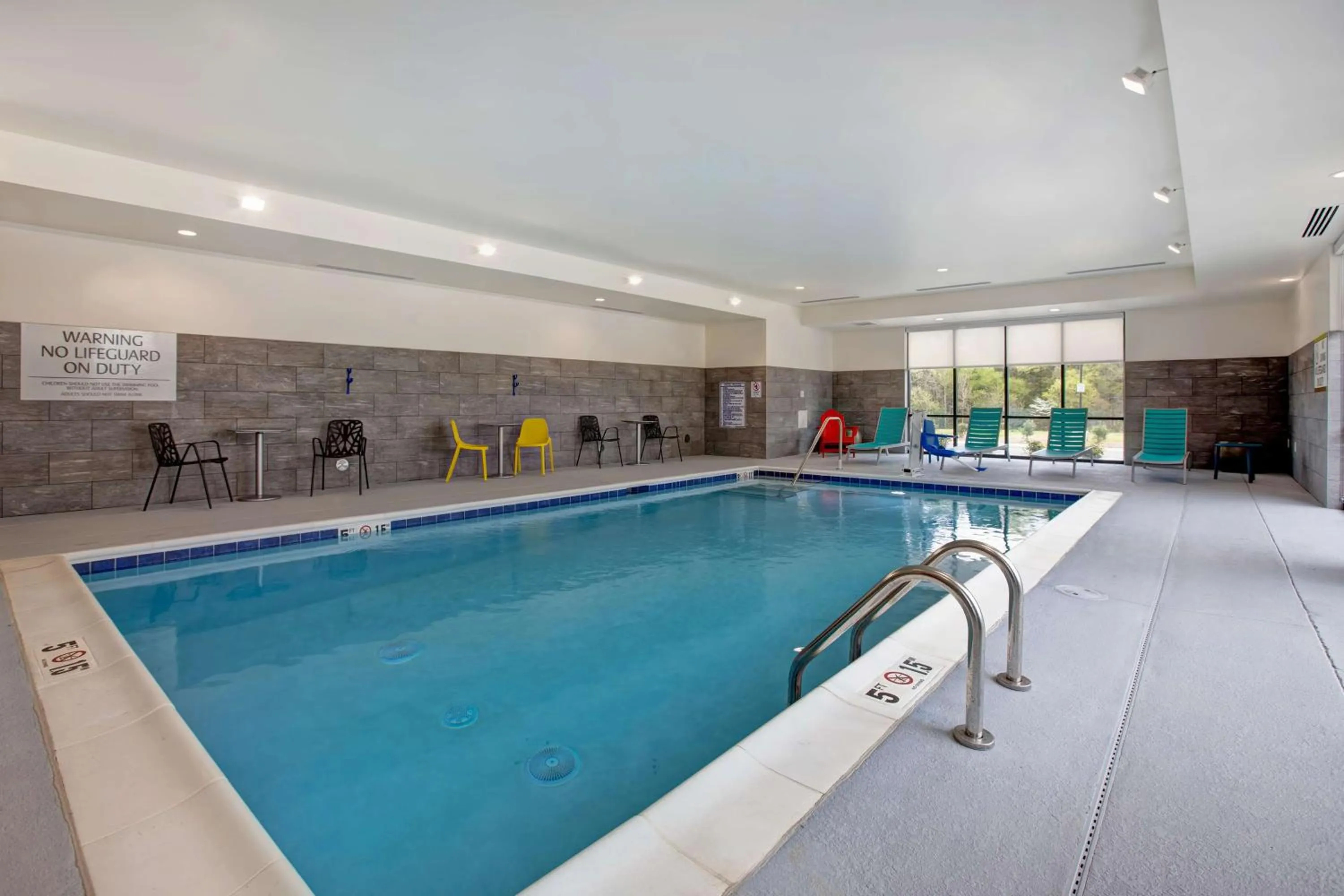 Pool view in Home2 Suites By Hilton Charlotte Northlake