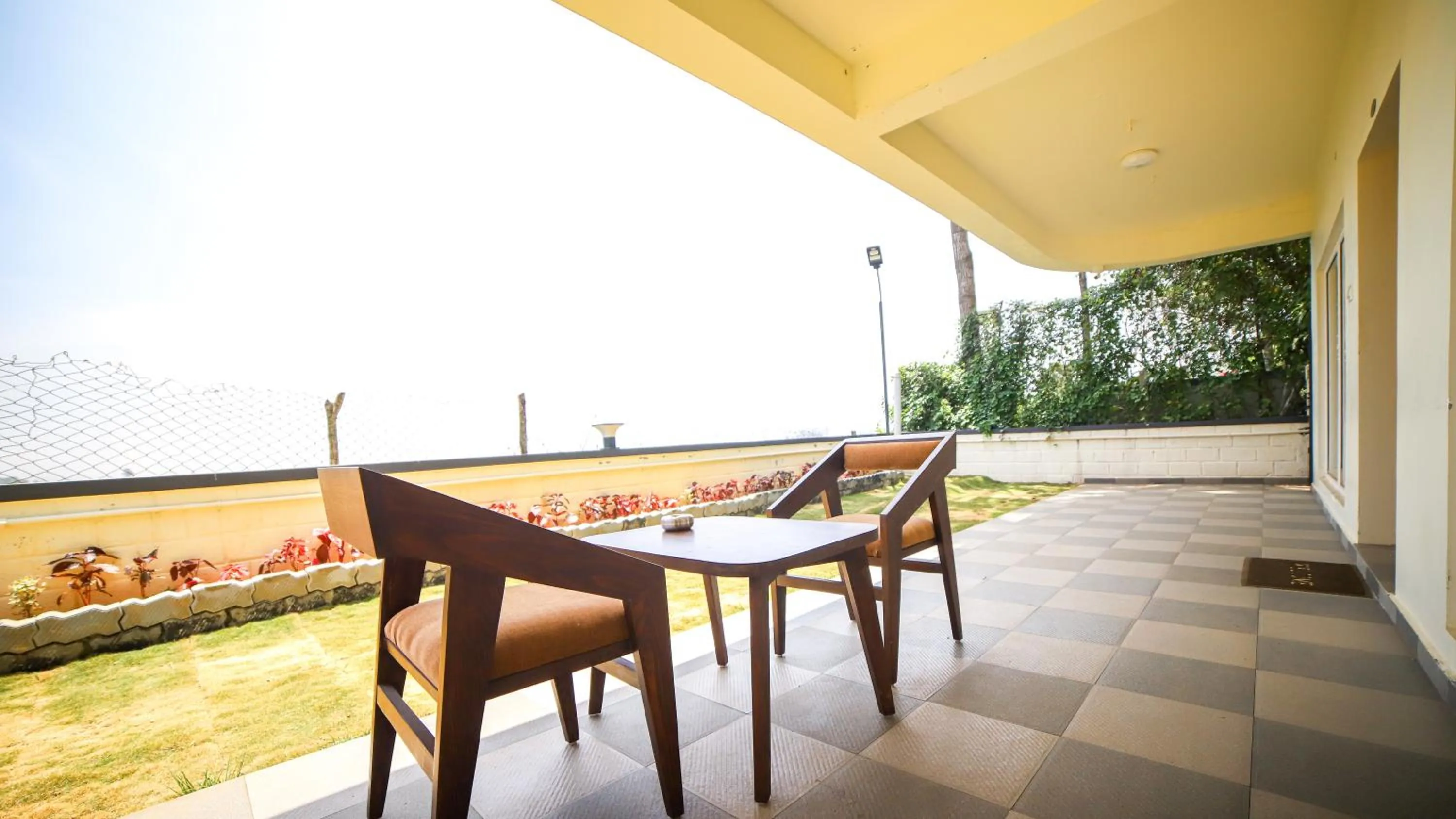 Seating area in Aira Residency Kothagiri by Lexstays