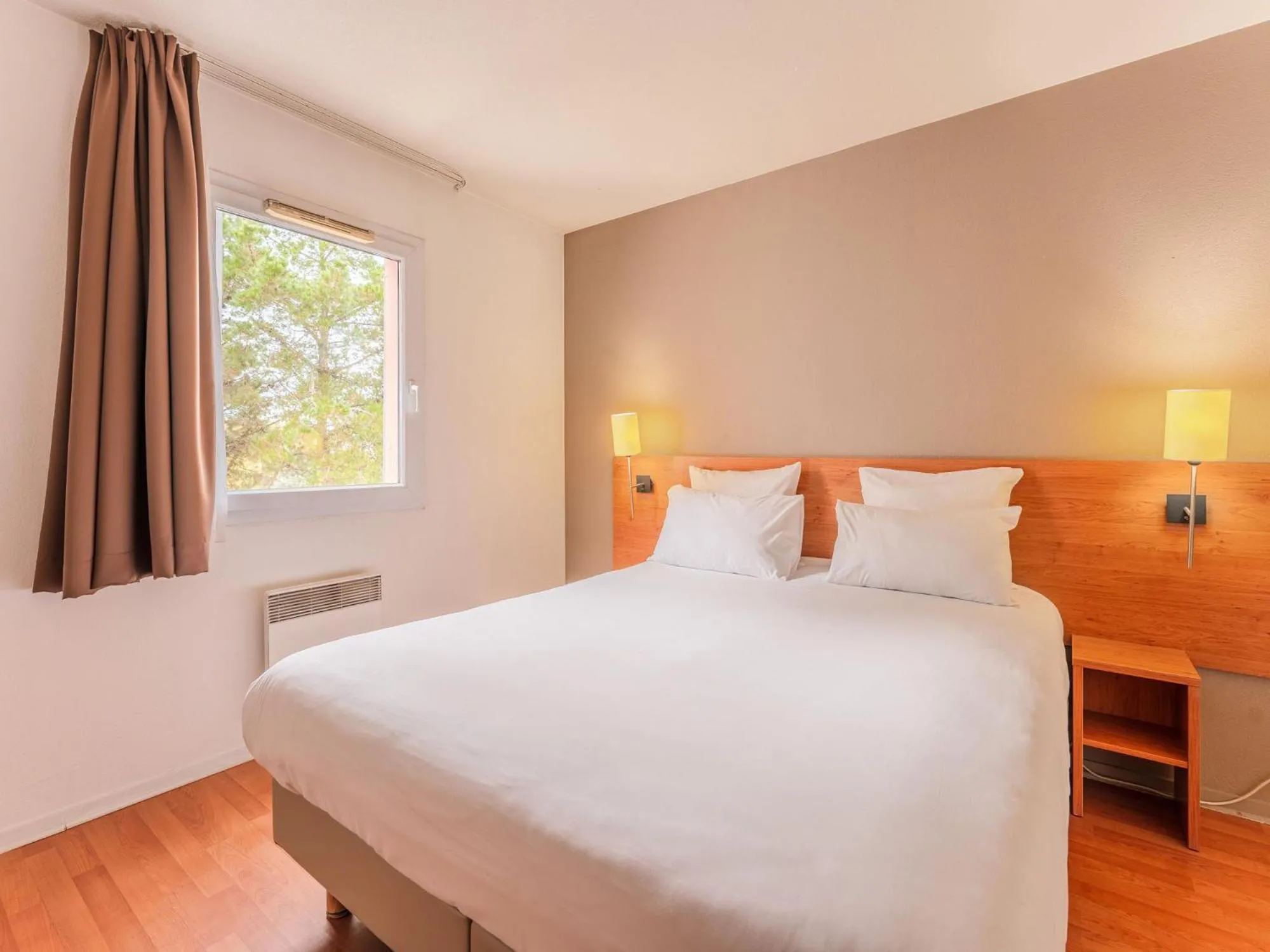 Bedroom, Bed in Séjours & Affaires Nantes La Beaujoire