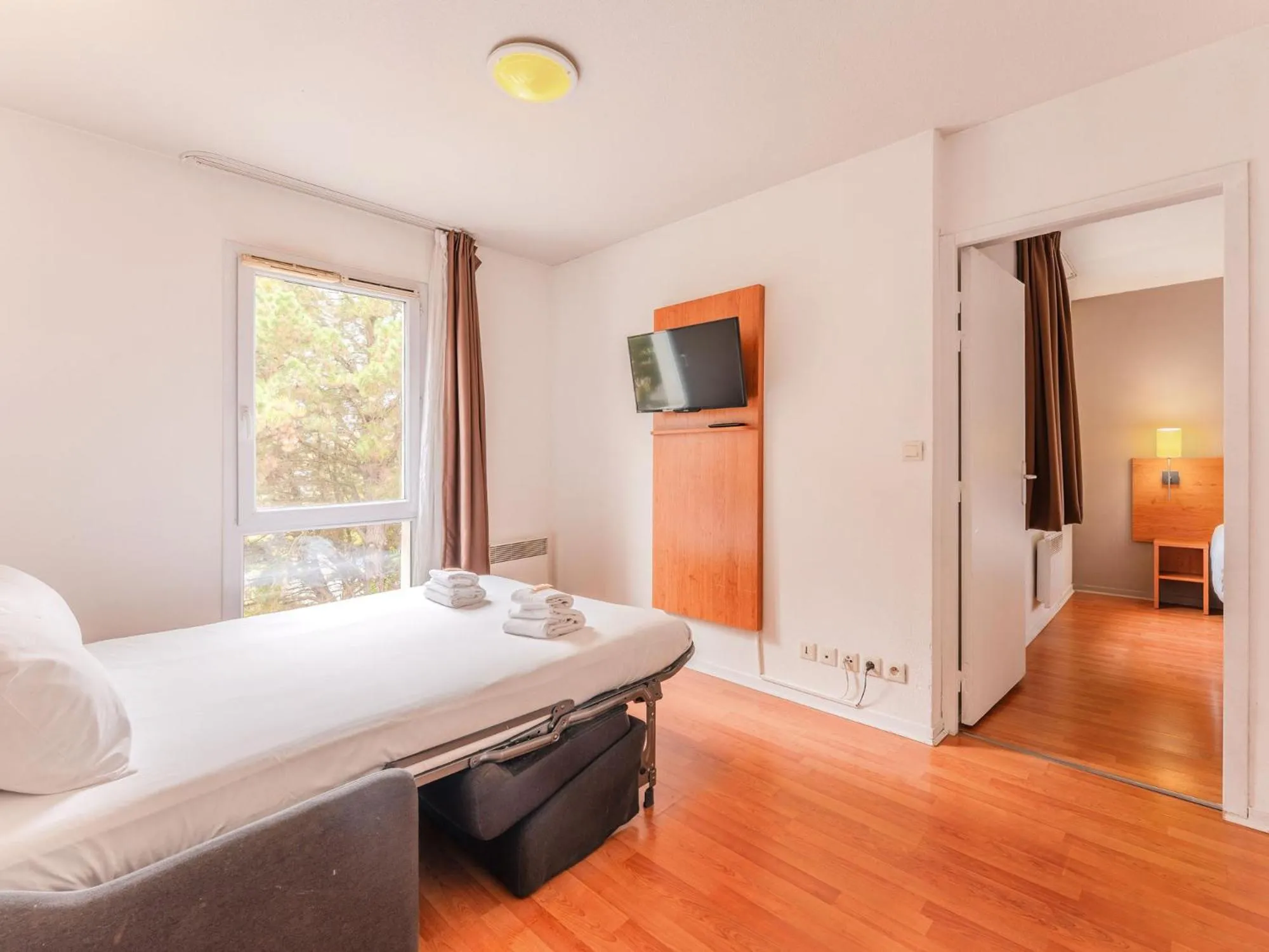 Bedroom, Bed in Séjours & Affaires Nantes La Beaujoire