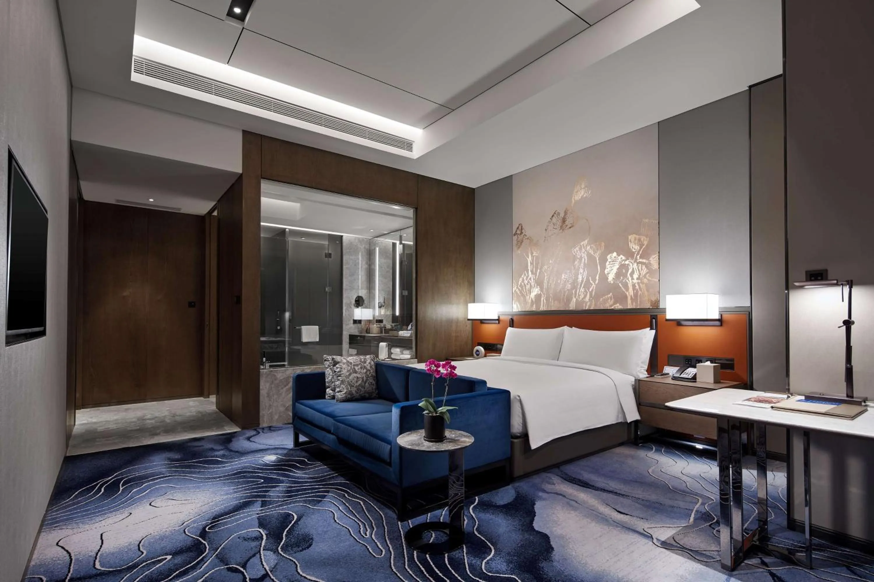 Living room, Bed in Hilton Guiyang