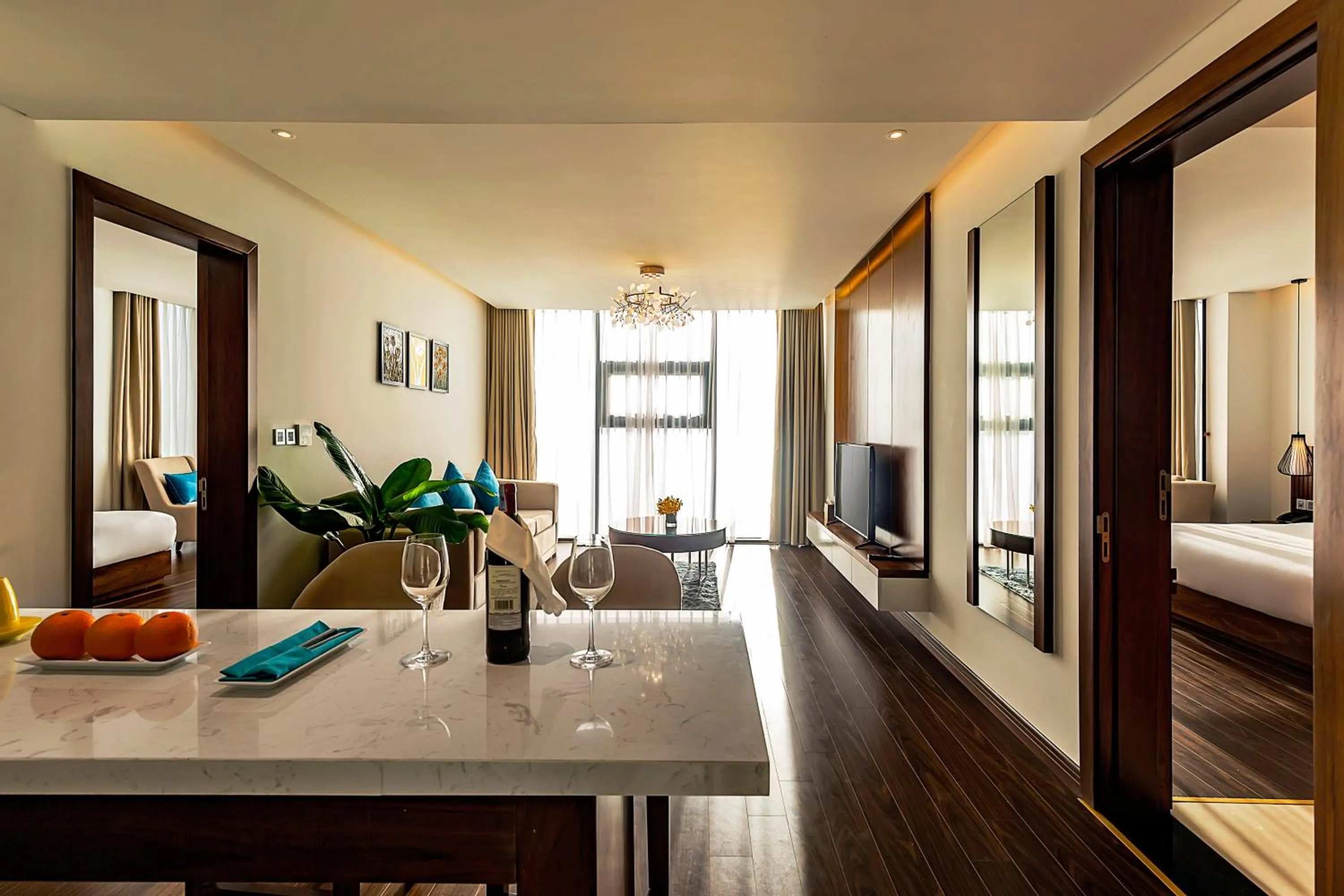 Living room, Bed in Maximilan Danang Beach Hotel