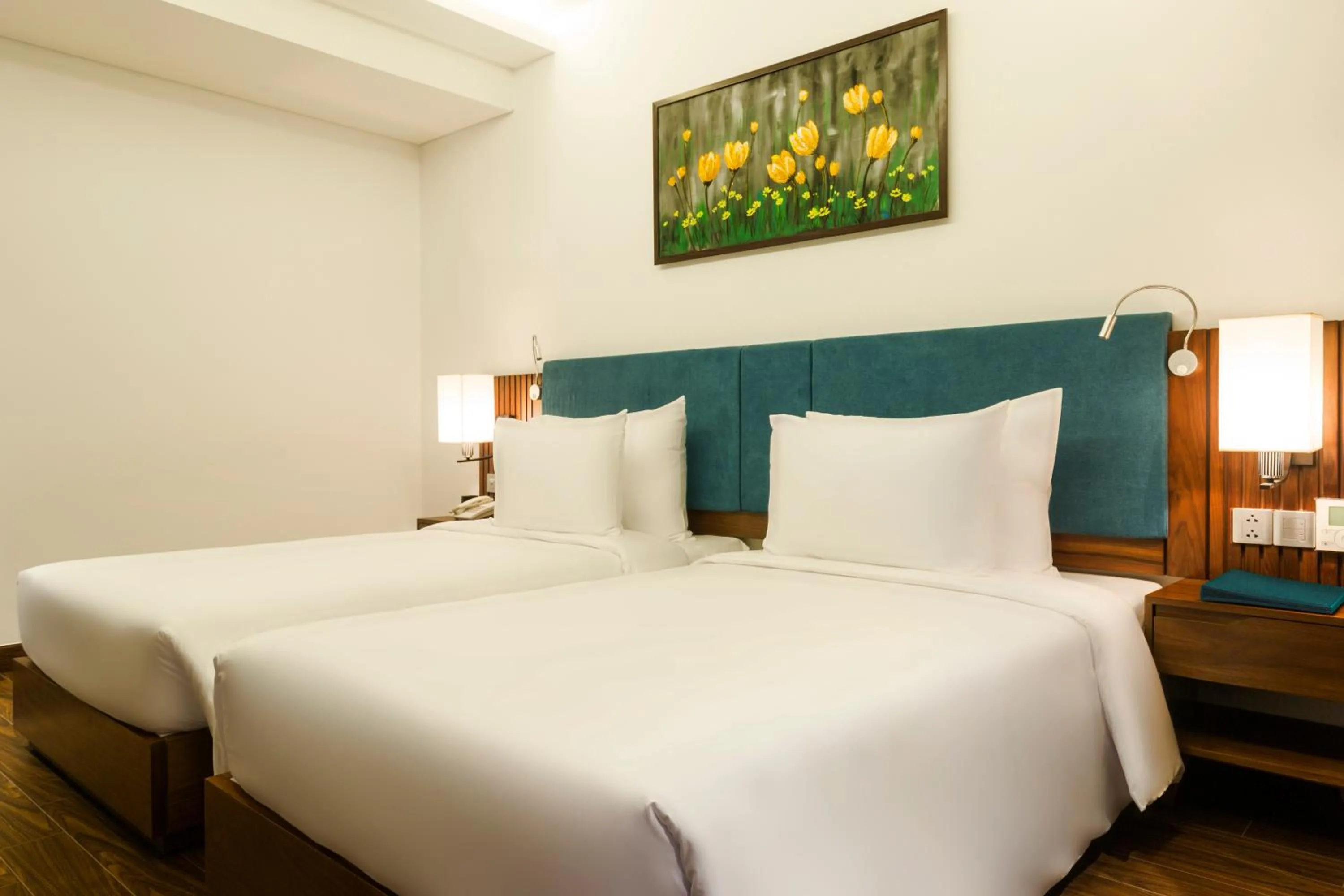 Photo of the whole room, Bed in Maximilan Danang Beach Hotel