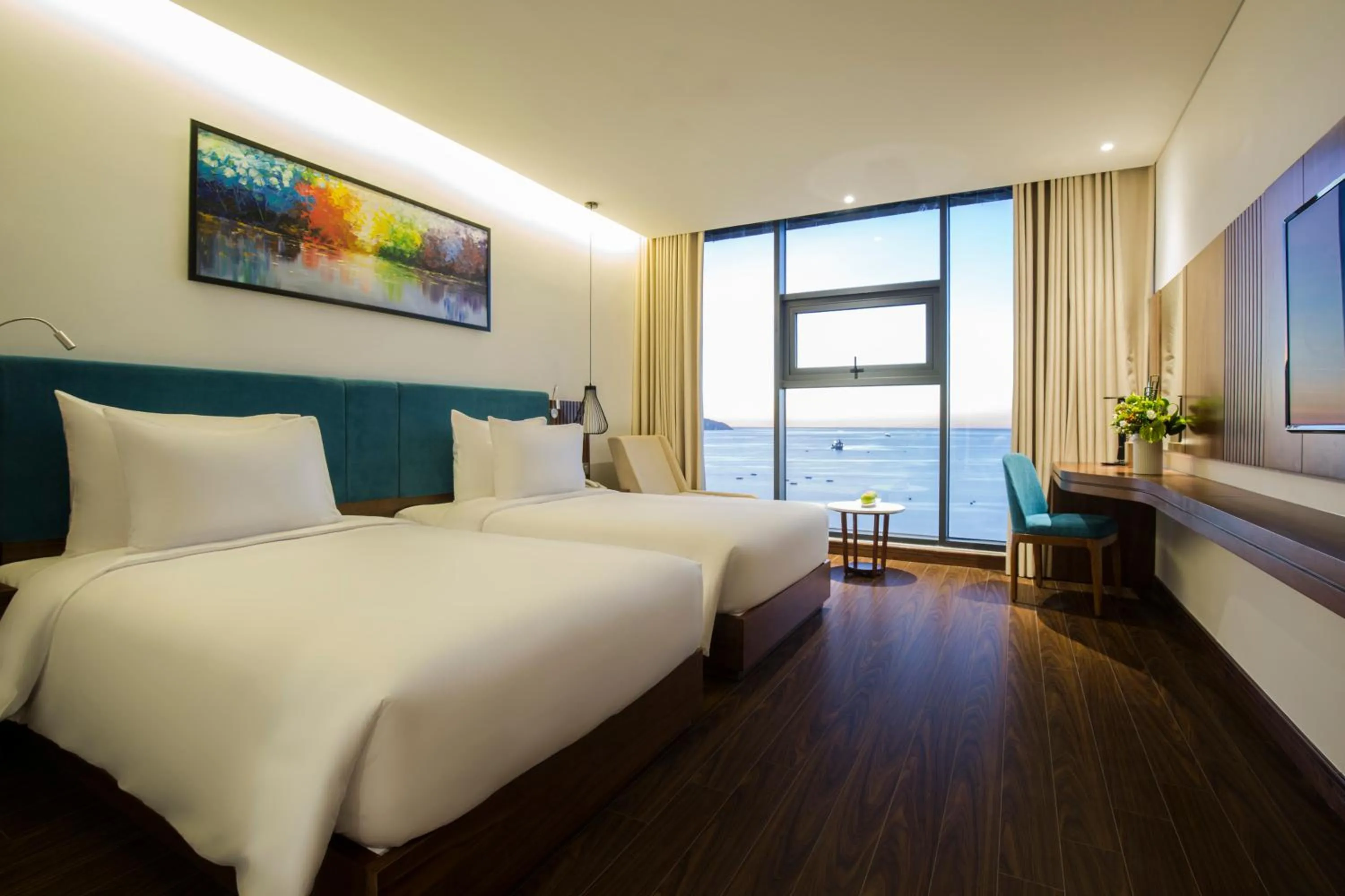 Photo of the whole room, Bed in Maximilan Danang Beach Hotel