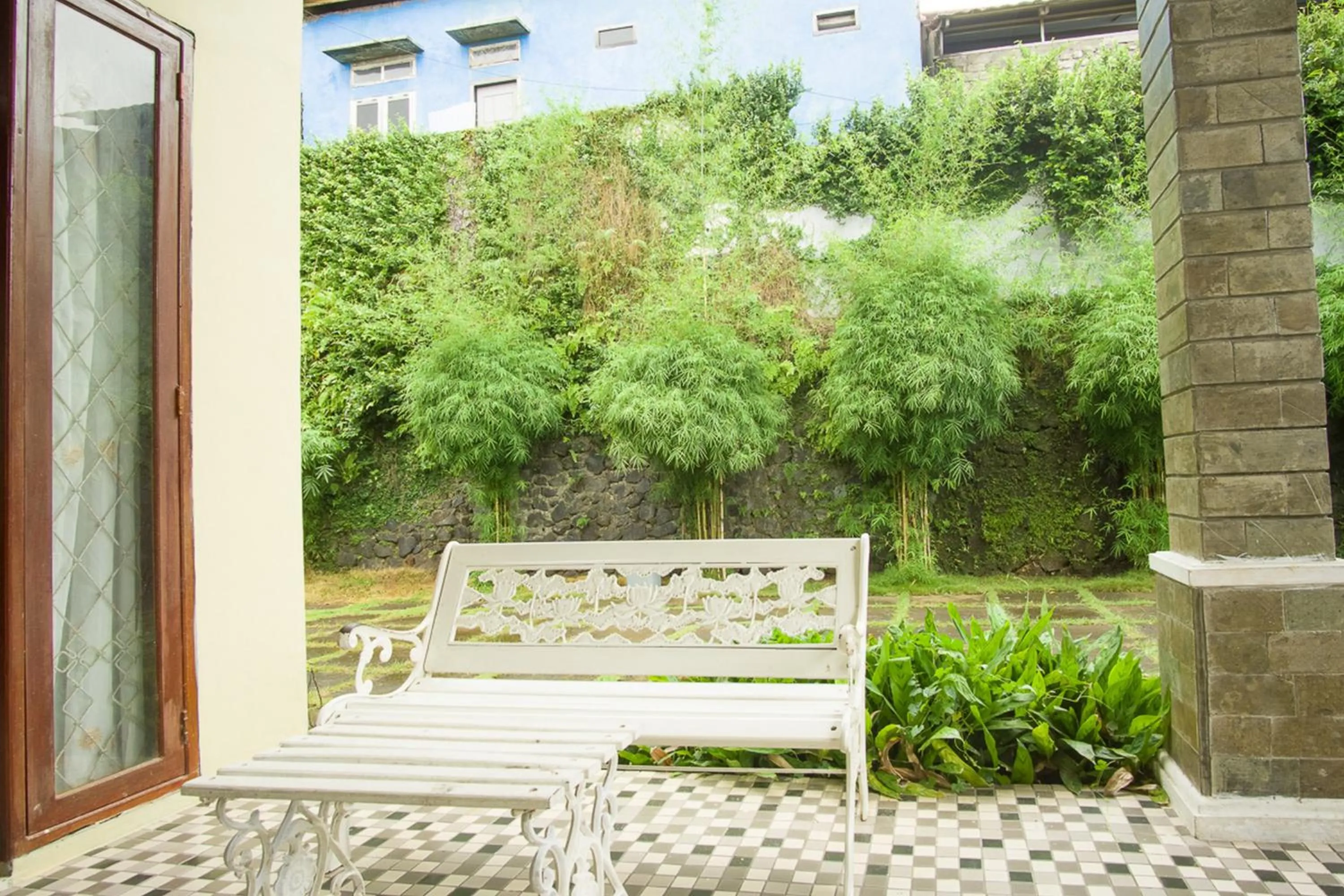 Seating area in RedDoorz Syariah near Ngade Lake Ternate