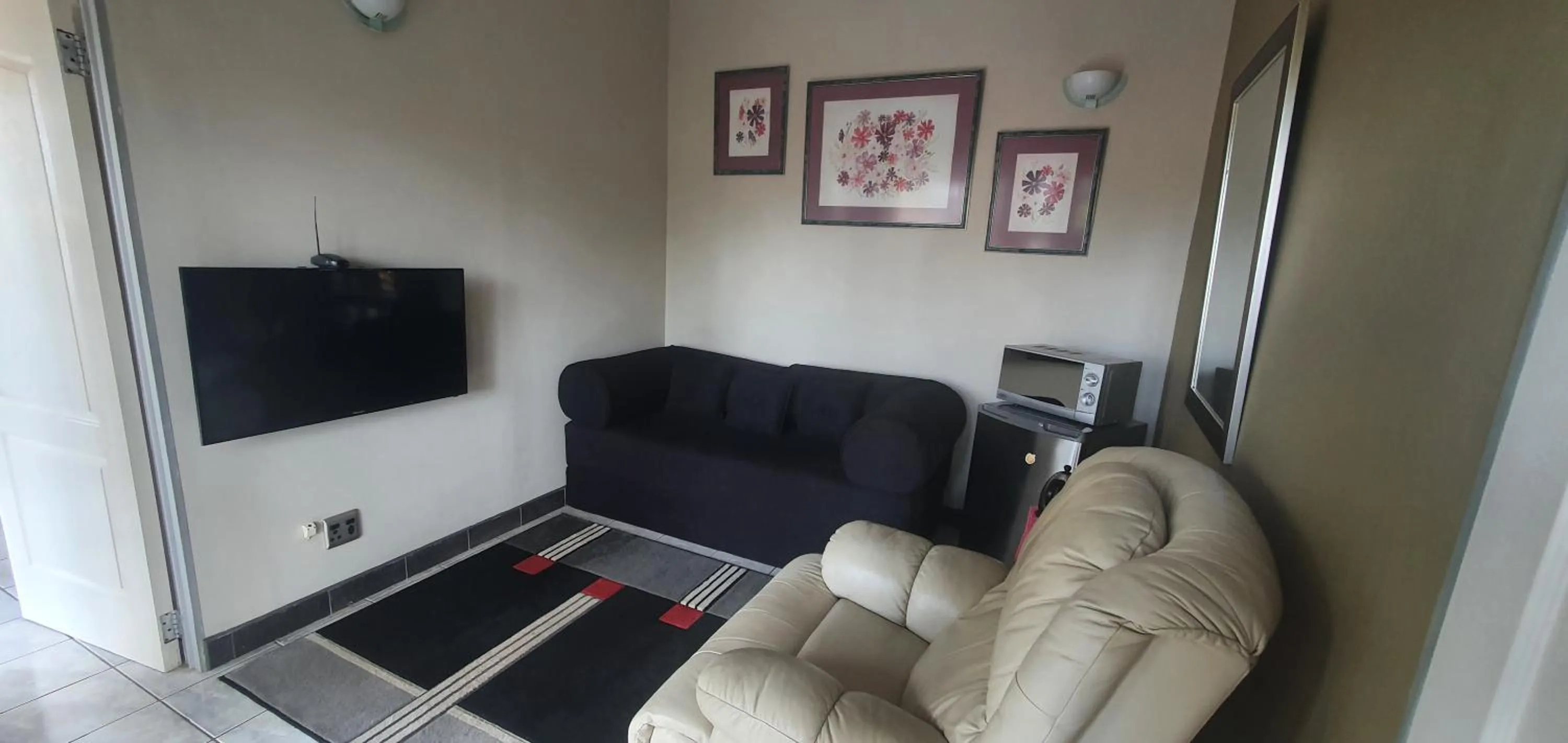 Seating area in Bon A Vie Self-catering and b&b Gonubie Full Solar Power, no load shedding!