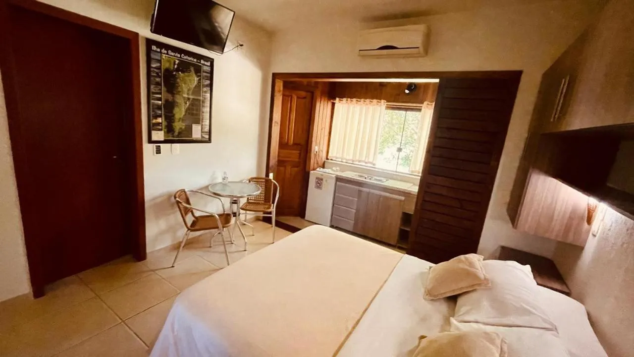 Bed in Pousada Ilha dos Anjos