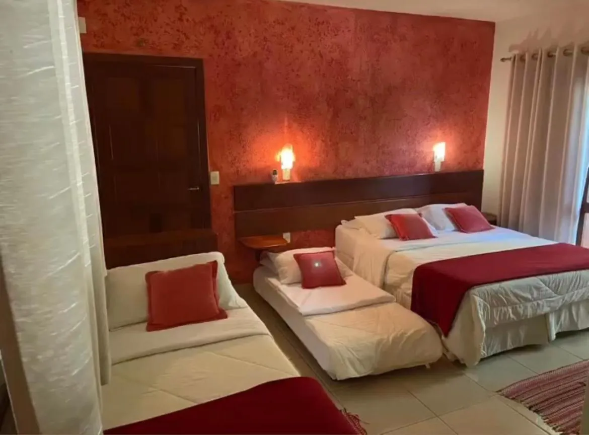 Bed in Pousada Ilha dos Anjos