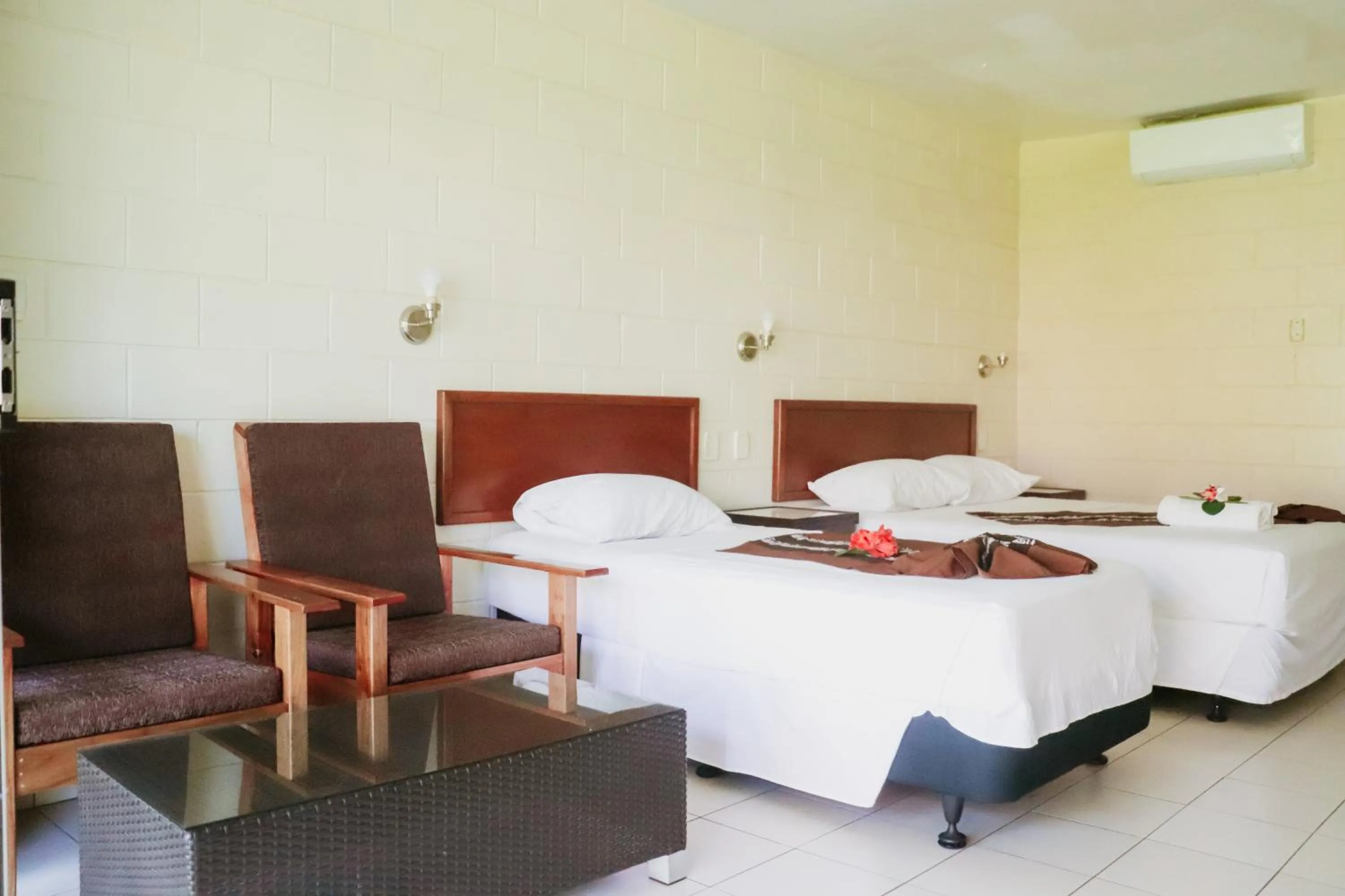 Photo of the whole room, Bed in Hotel Millenia Samoa