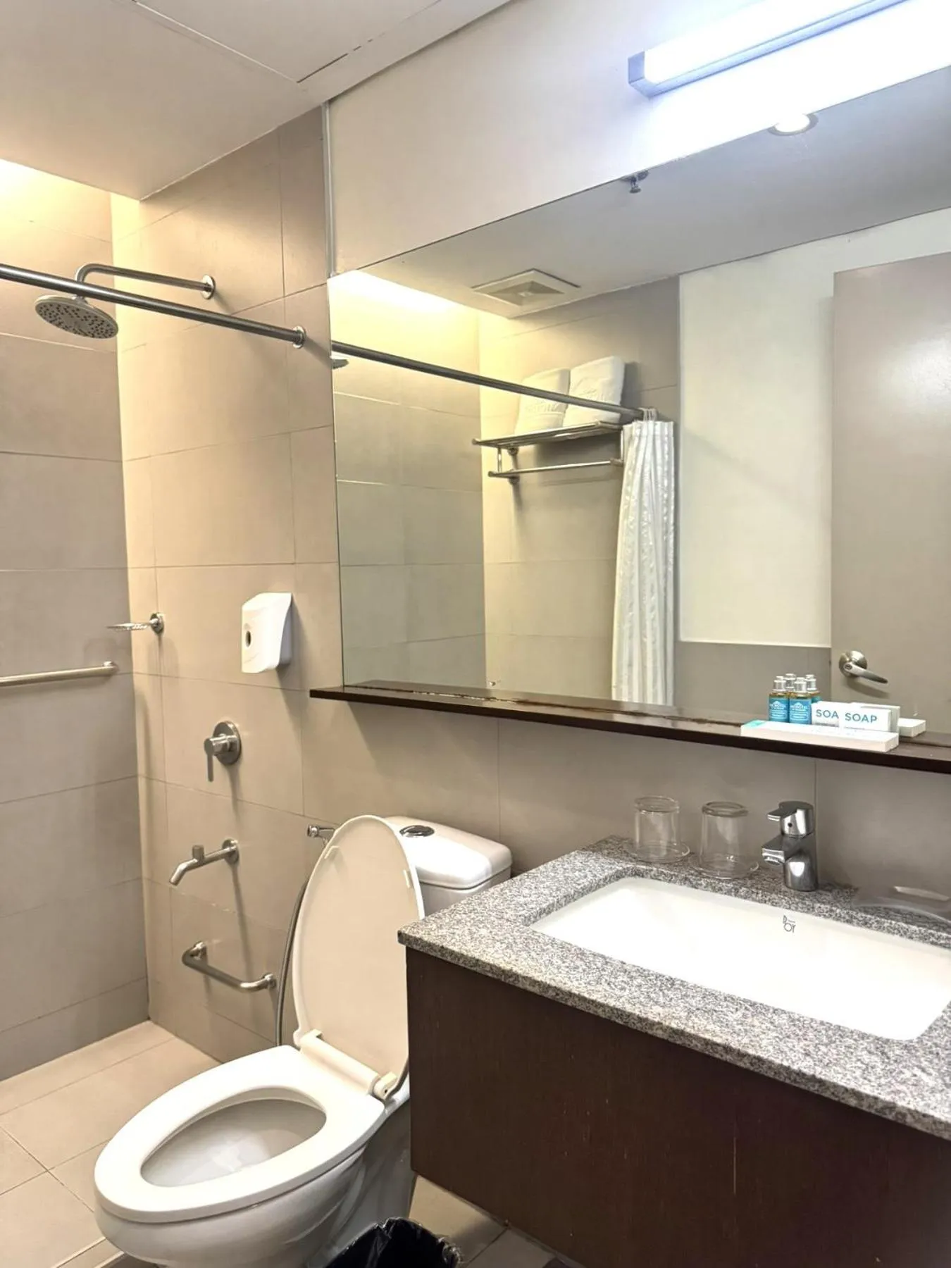 Toilet in Microtel by Wyndham Acropolis