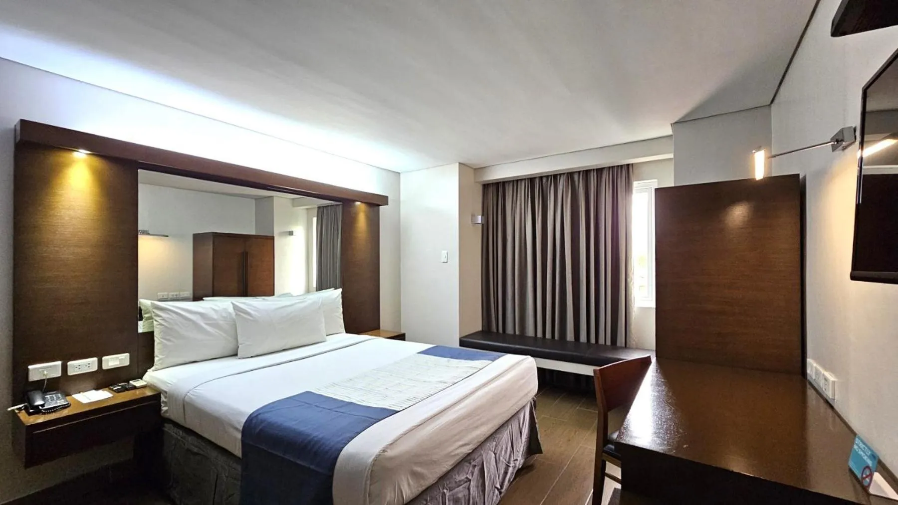 Bed in Microtel by Wyndham Acropolis