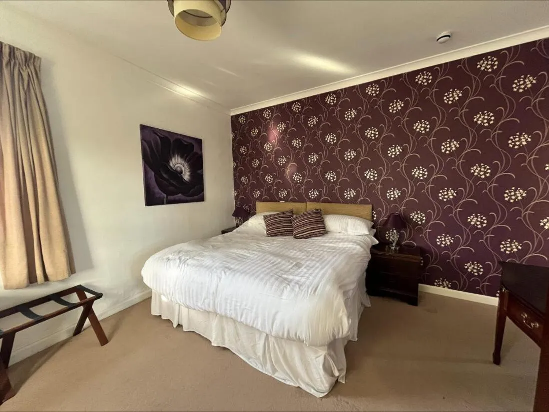 Bed in Trimstone Manor Hotel