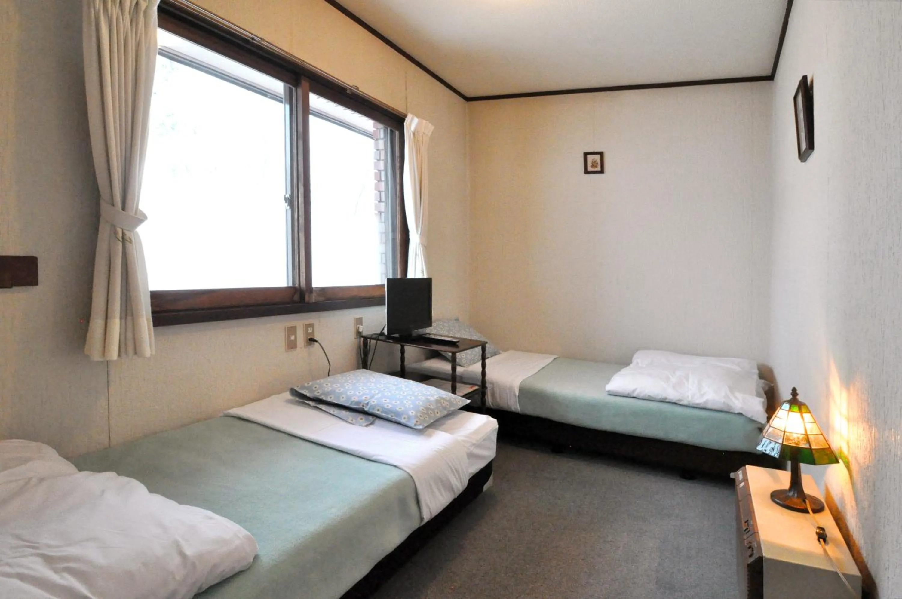 Photo of the whole room, Bed in Pension Risuno Koya