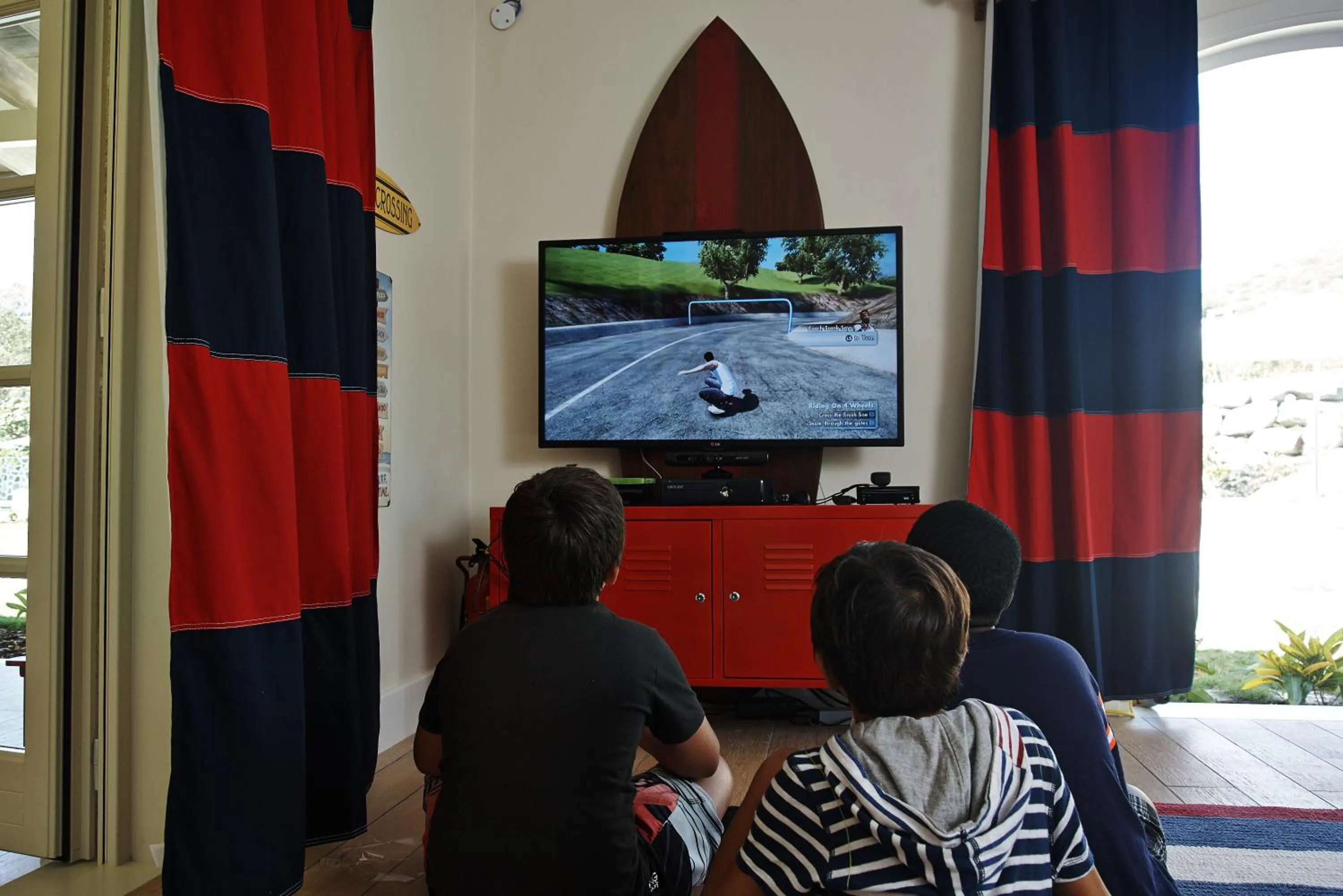 Communal lounge/ TV room in Canouan Estate Resort & Villas
