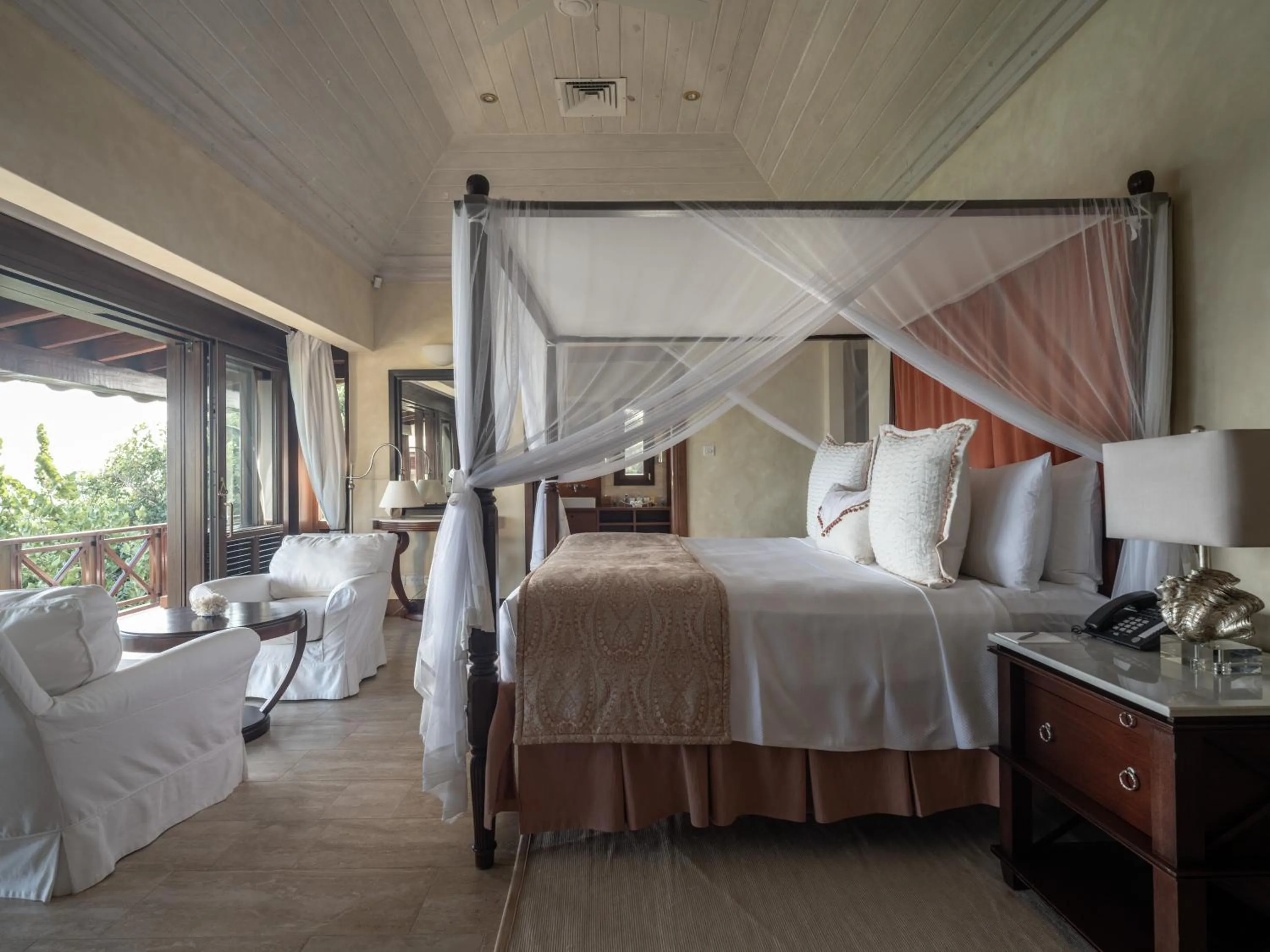 Bed in Canouan Estate Resort & Villas