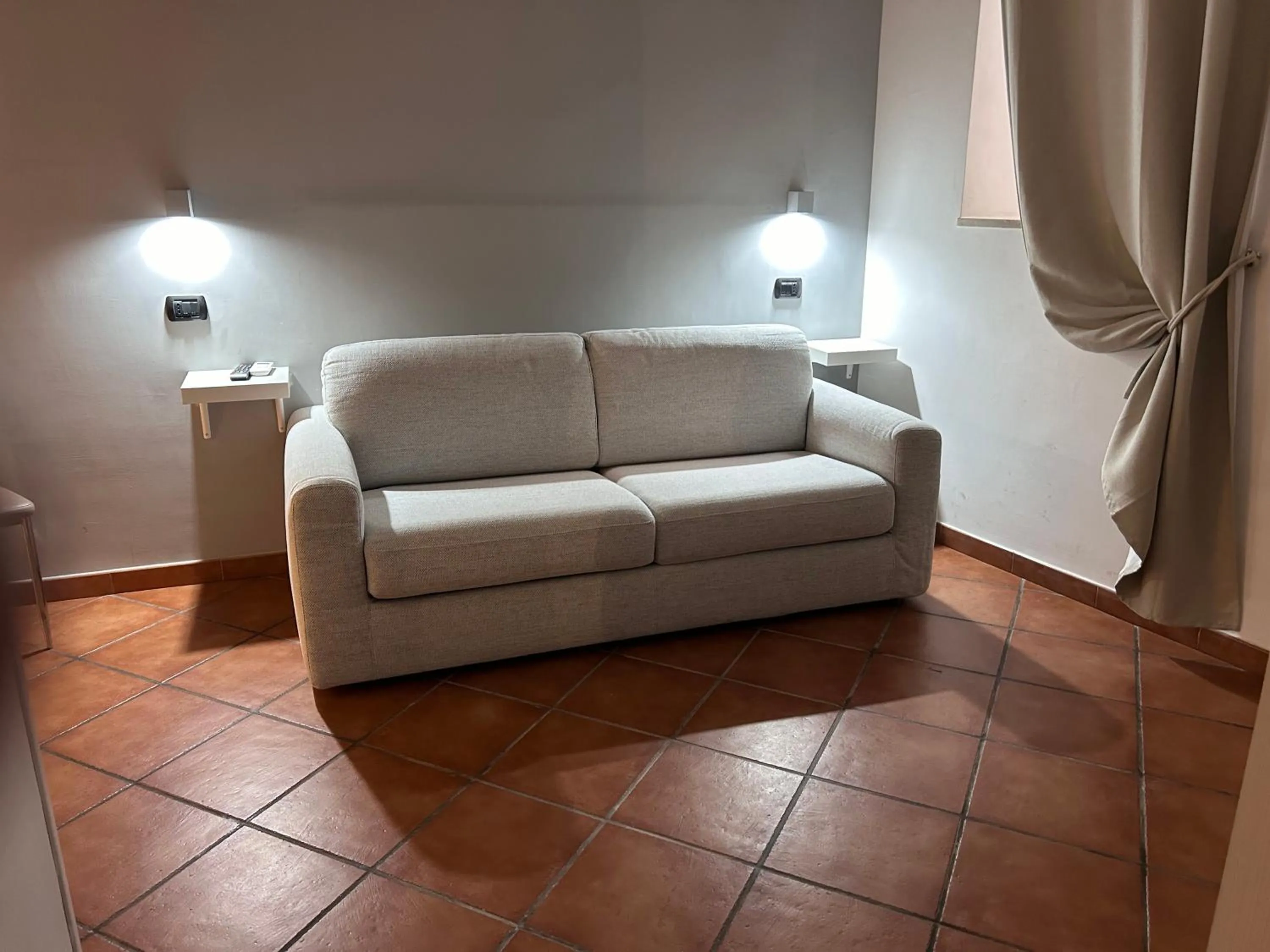 Living room in Base Napoli Plebiscito