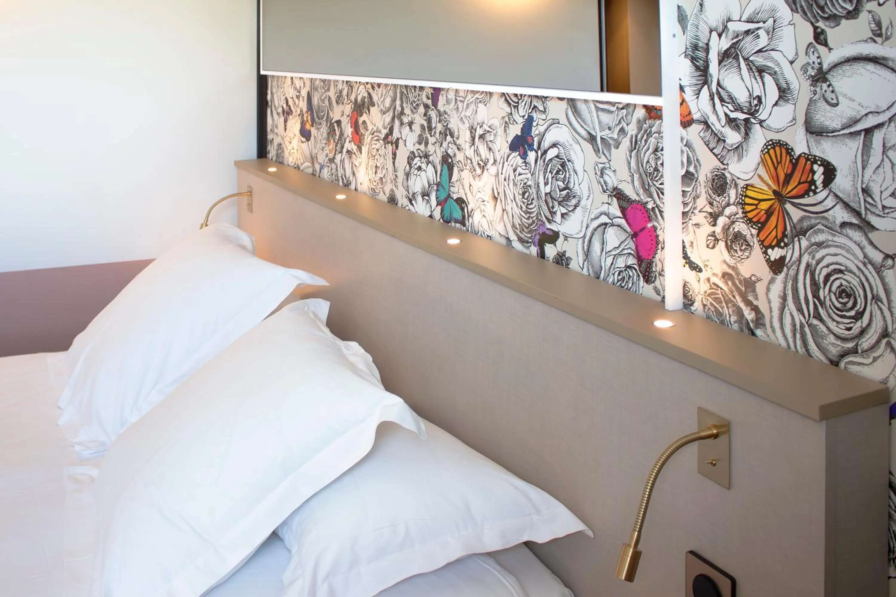 Decorative detail, Bed in Brit Hotel Nantes La Beaujoire Parc Expo