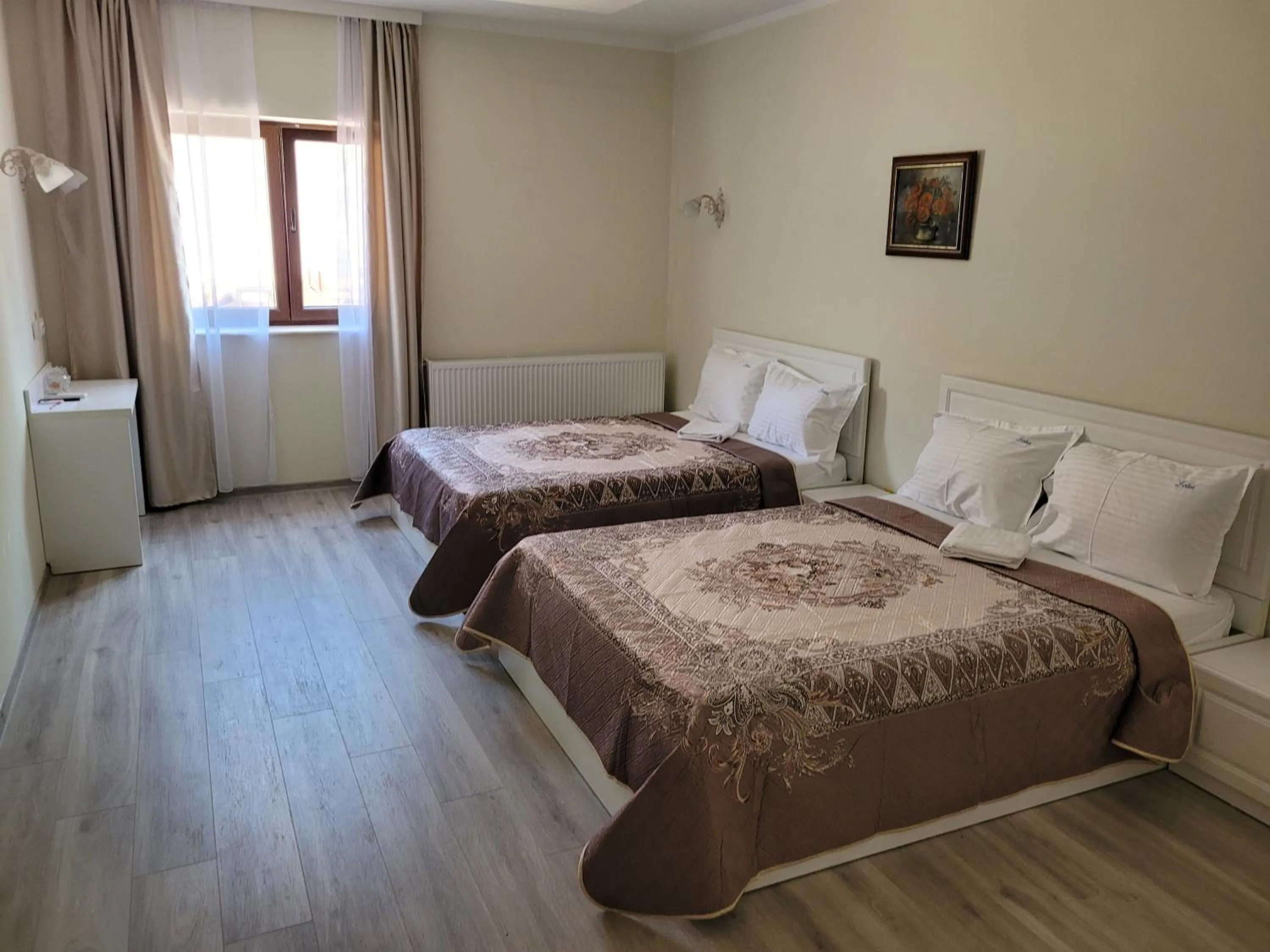 Photo of the whole room, Bed in LOTUS Boutique