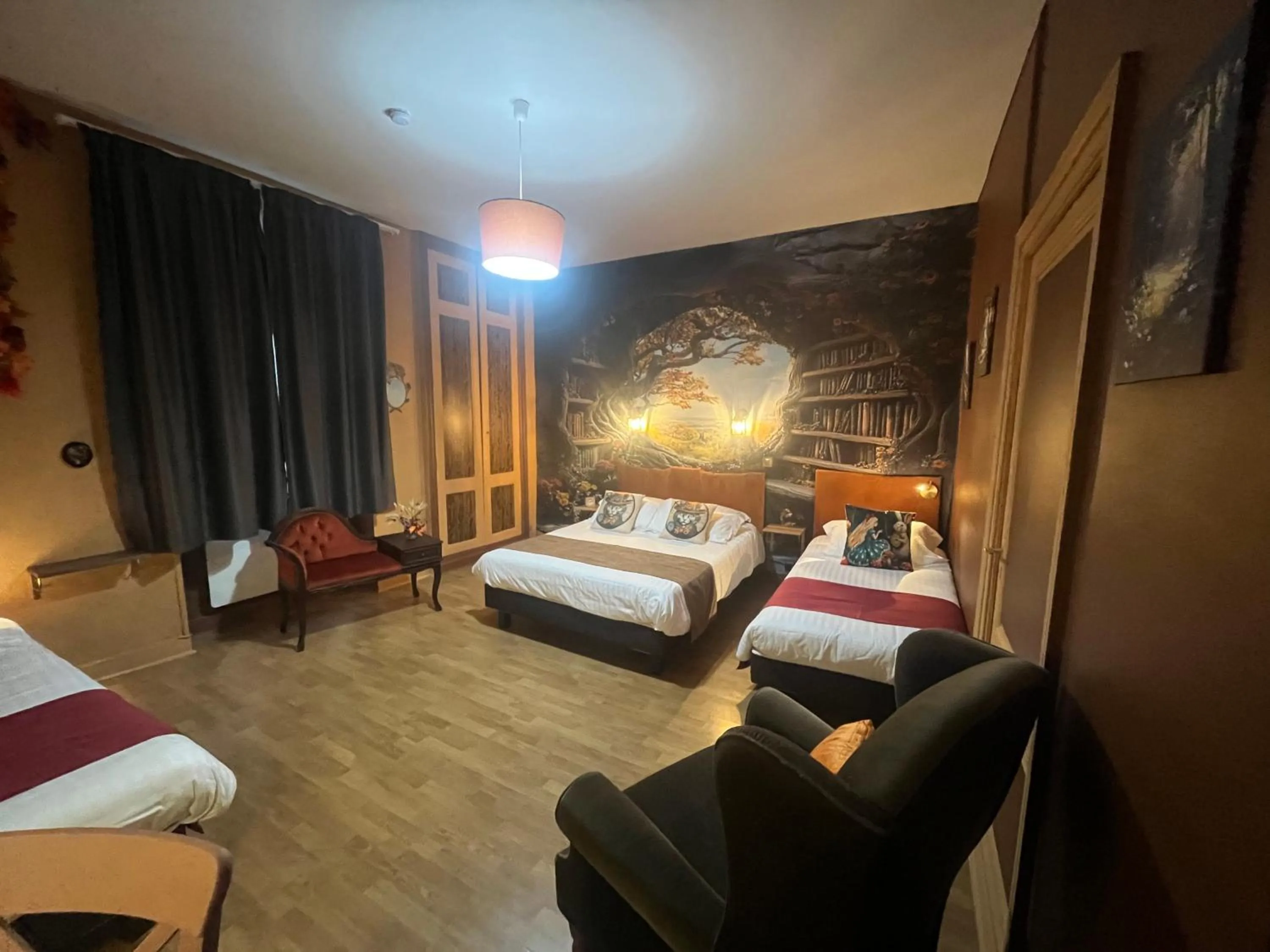 Bed in Logis Hôtel Le Cygne